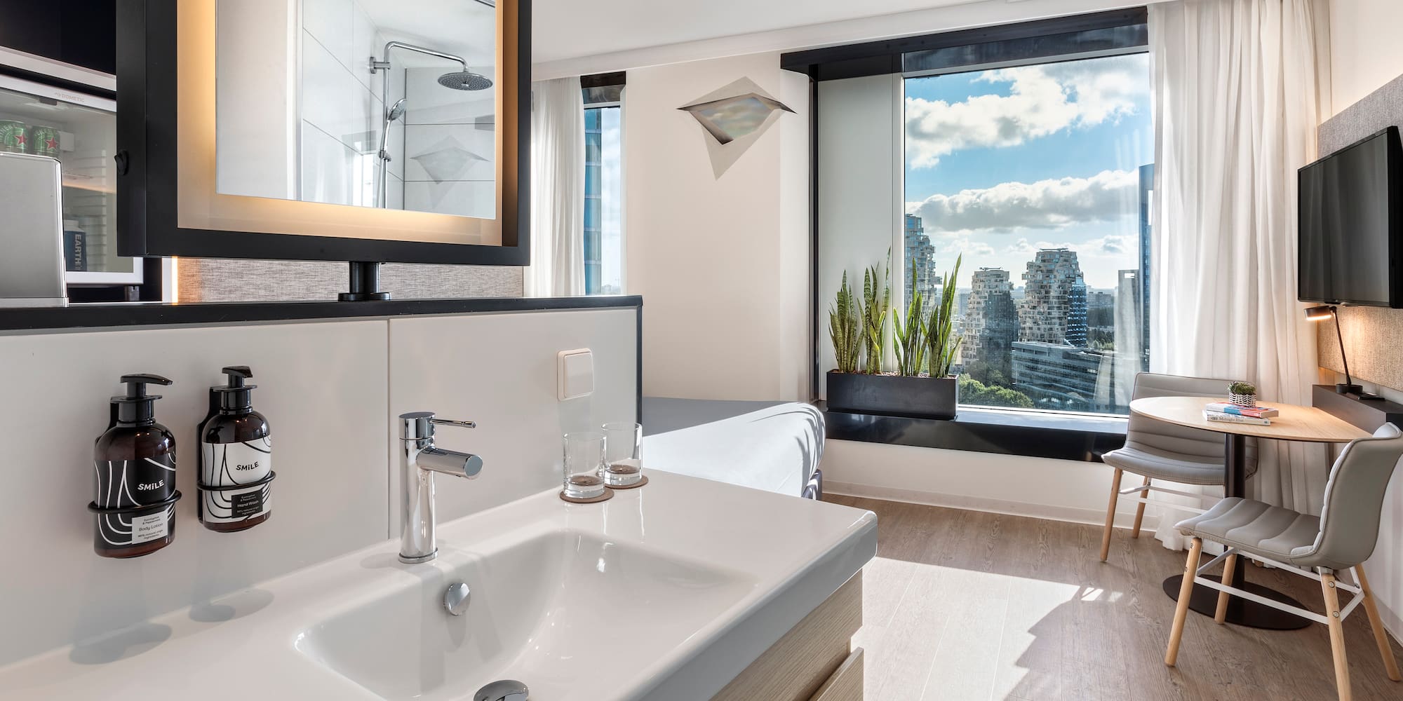 a bathroom with a mirror and sink