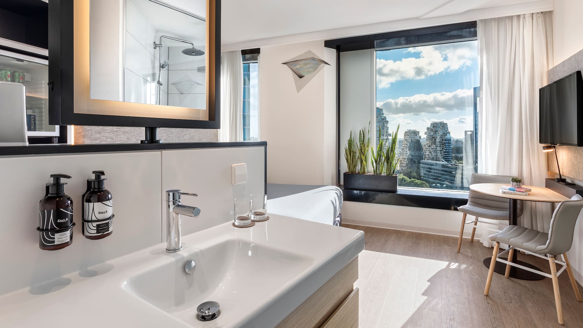 a bathroom with a mirror and sink