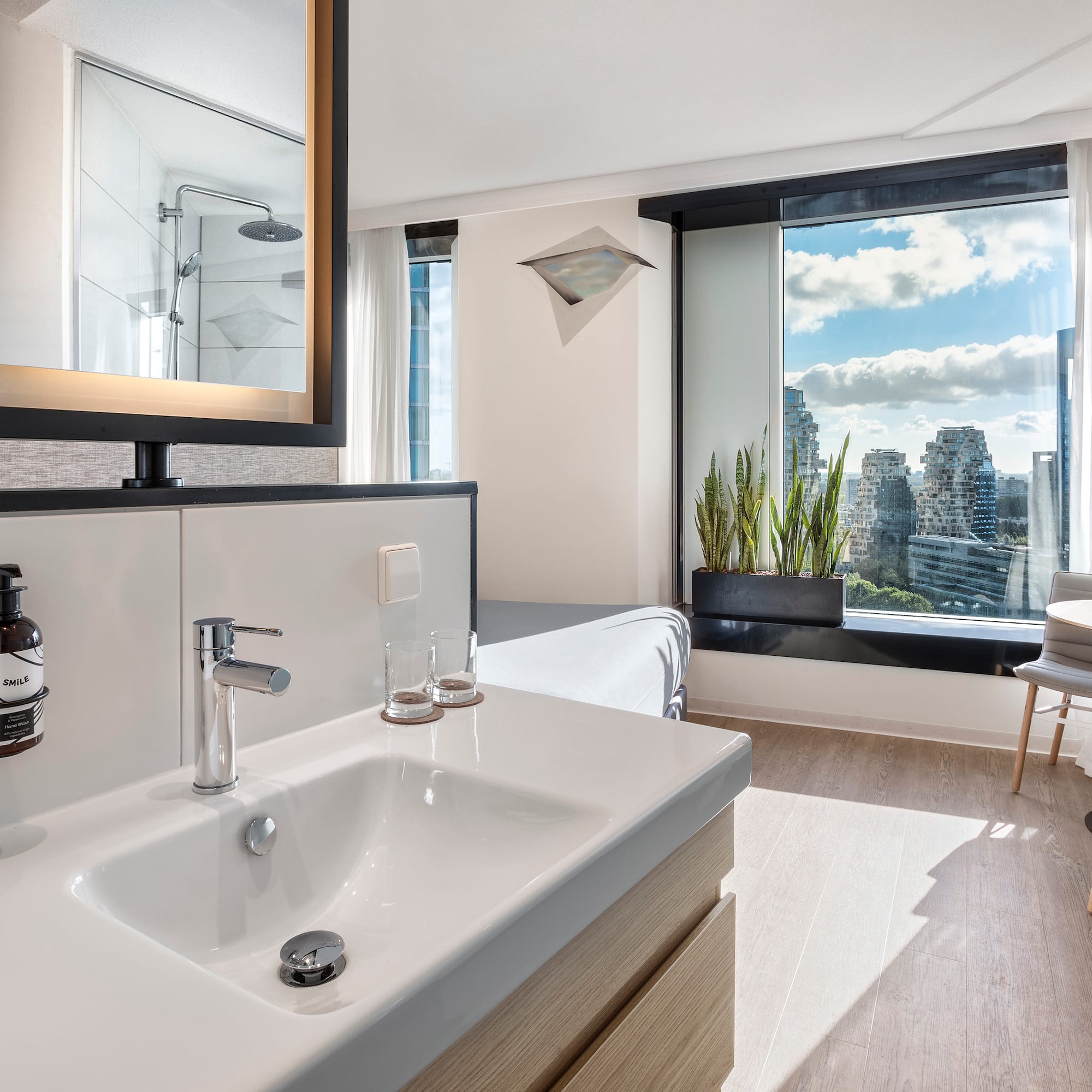 a bathroom with a mirror and sink