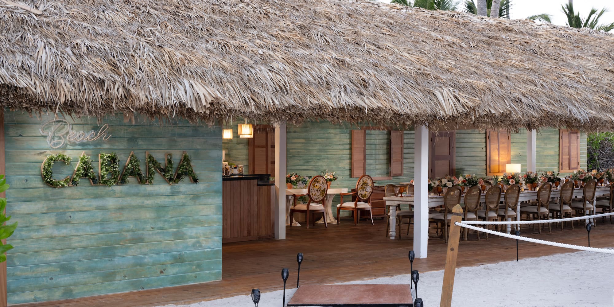 a hut with a thatched roof