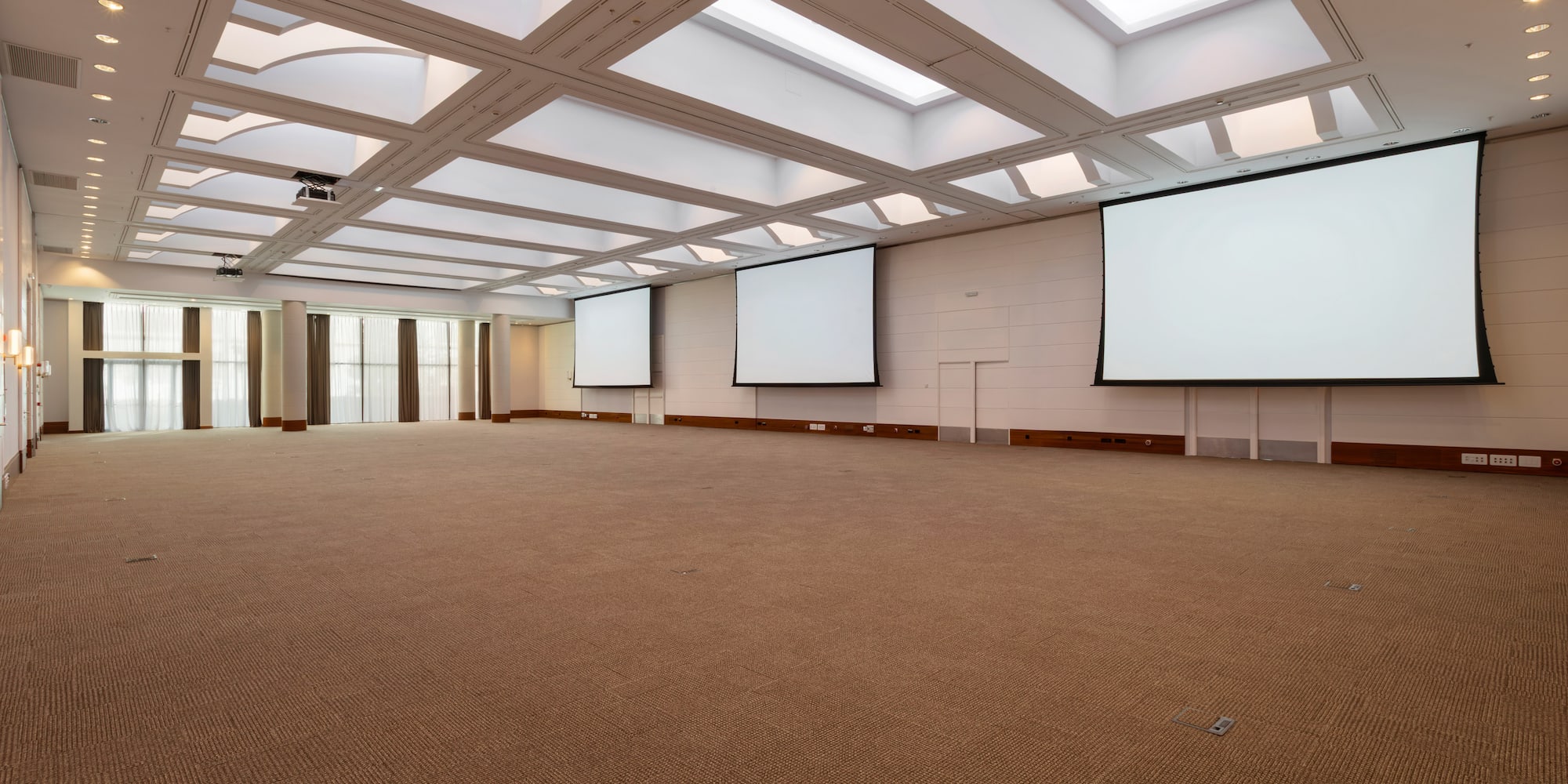 a large room with a large screen