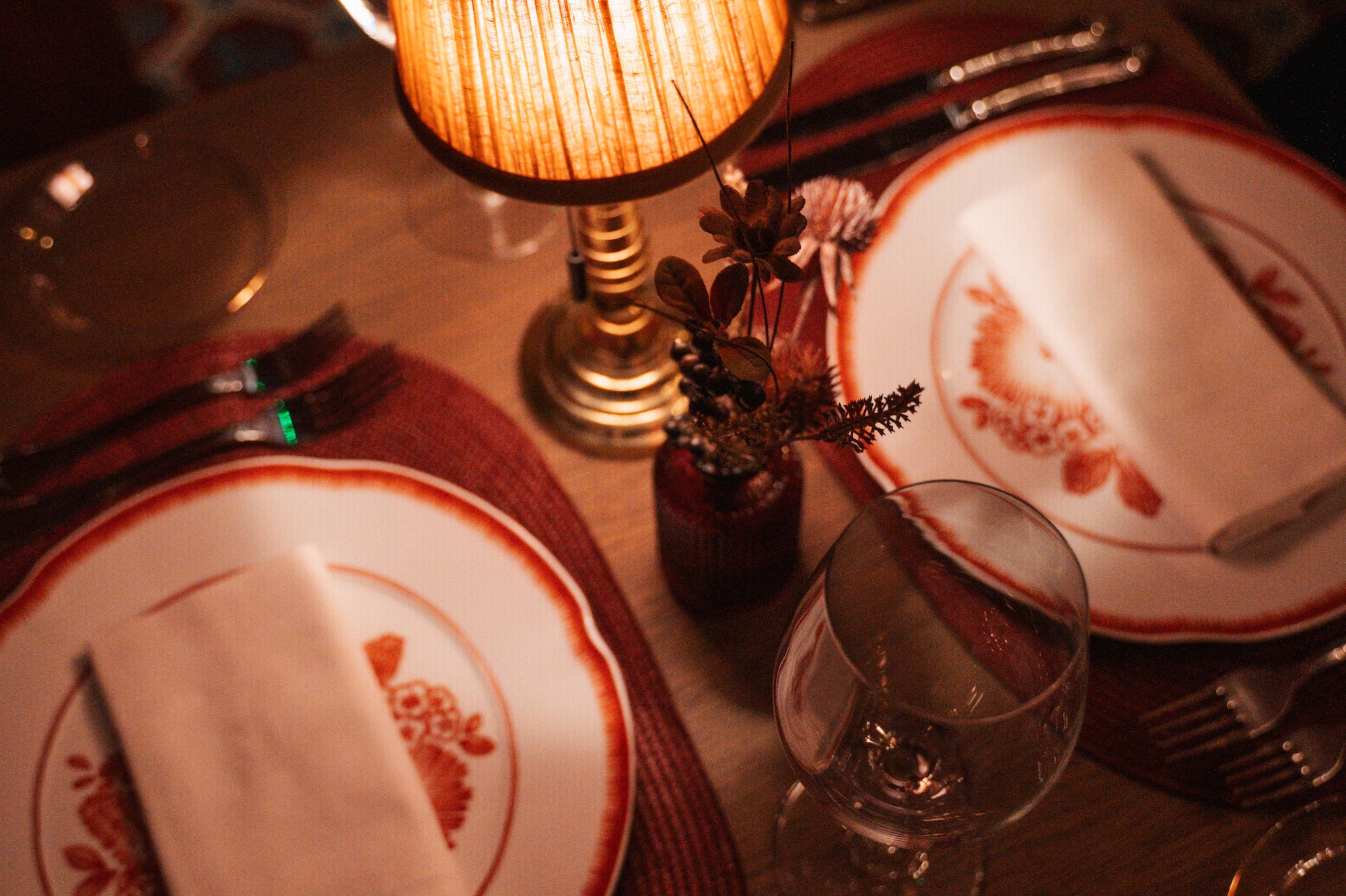 a table with plates and glasses