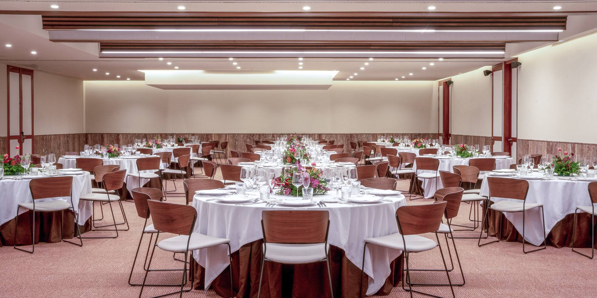 a large room with tables and chairs