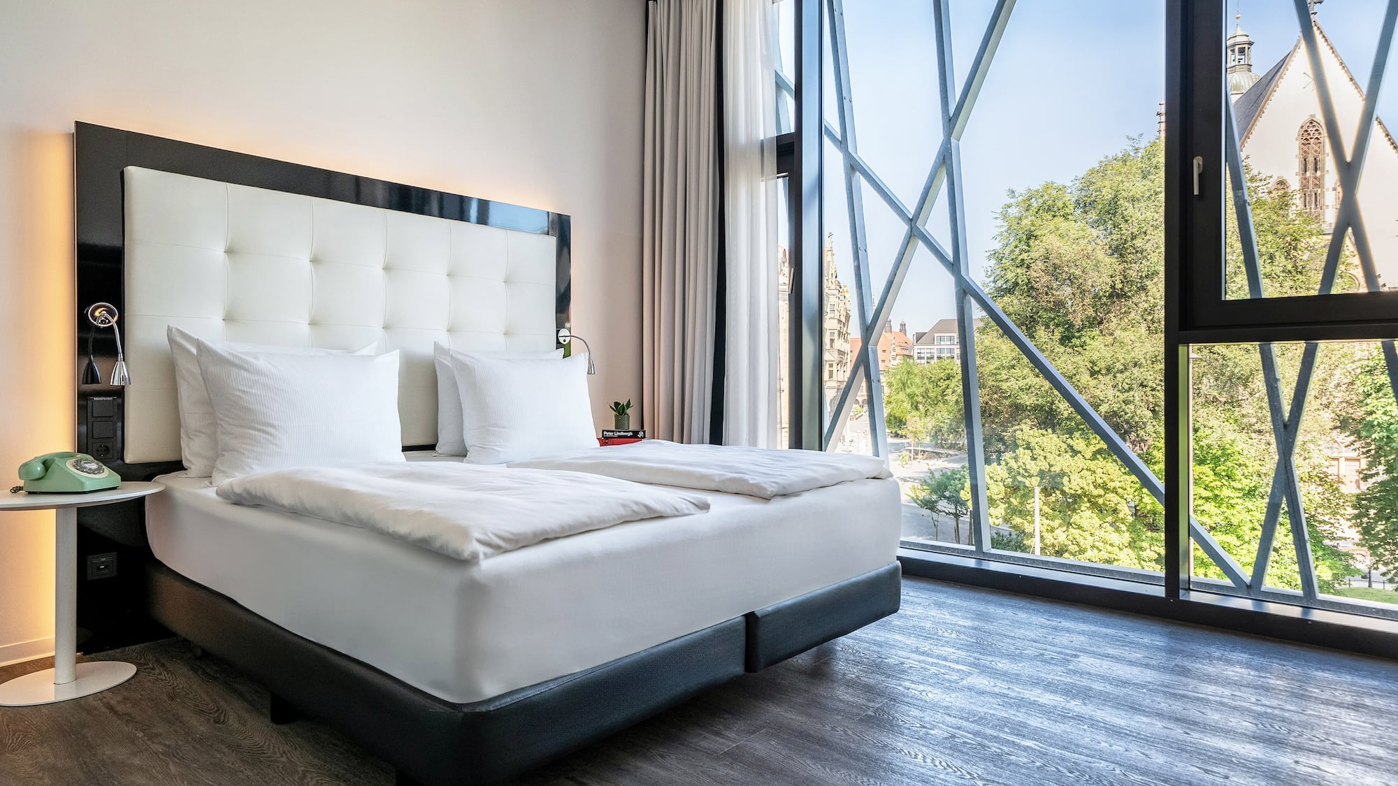 a bed with a large window