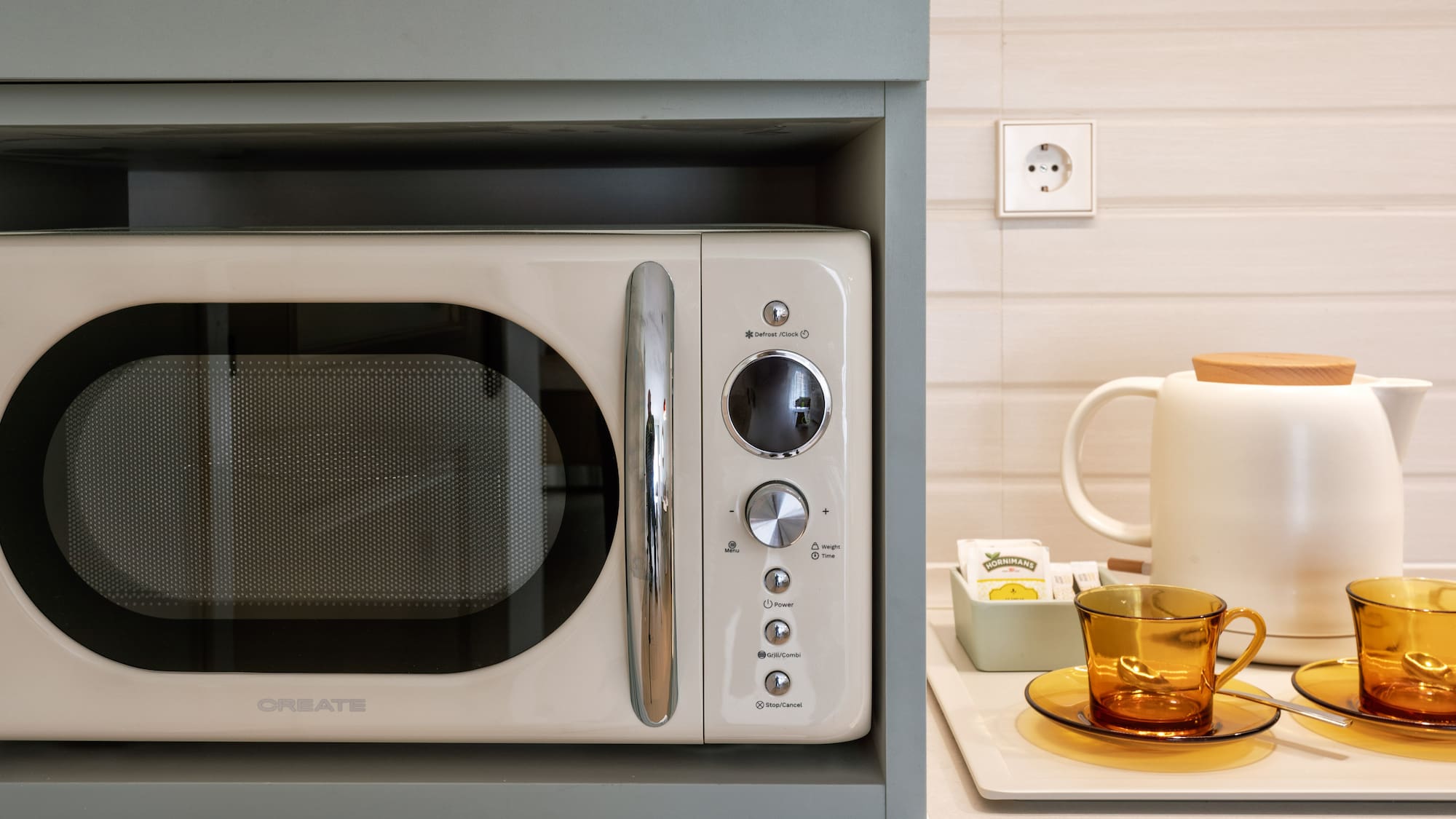 a microwave on a shelf