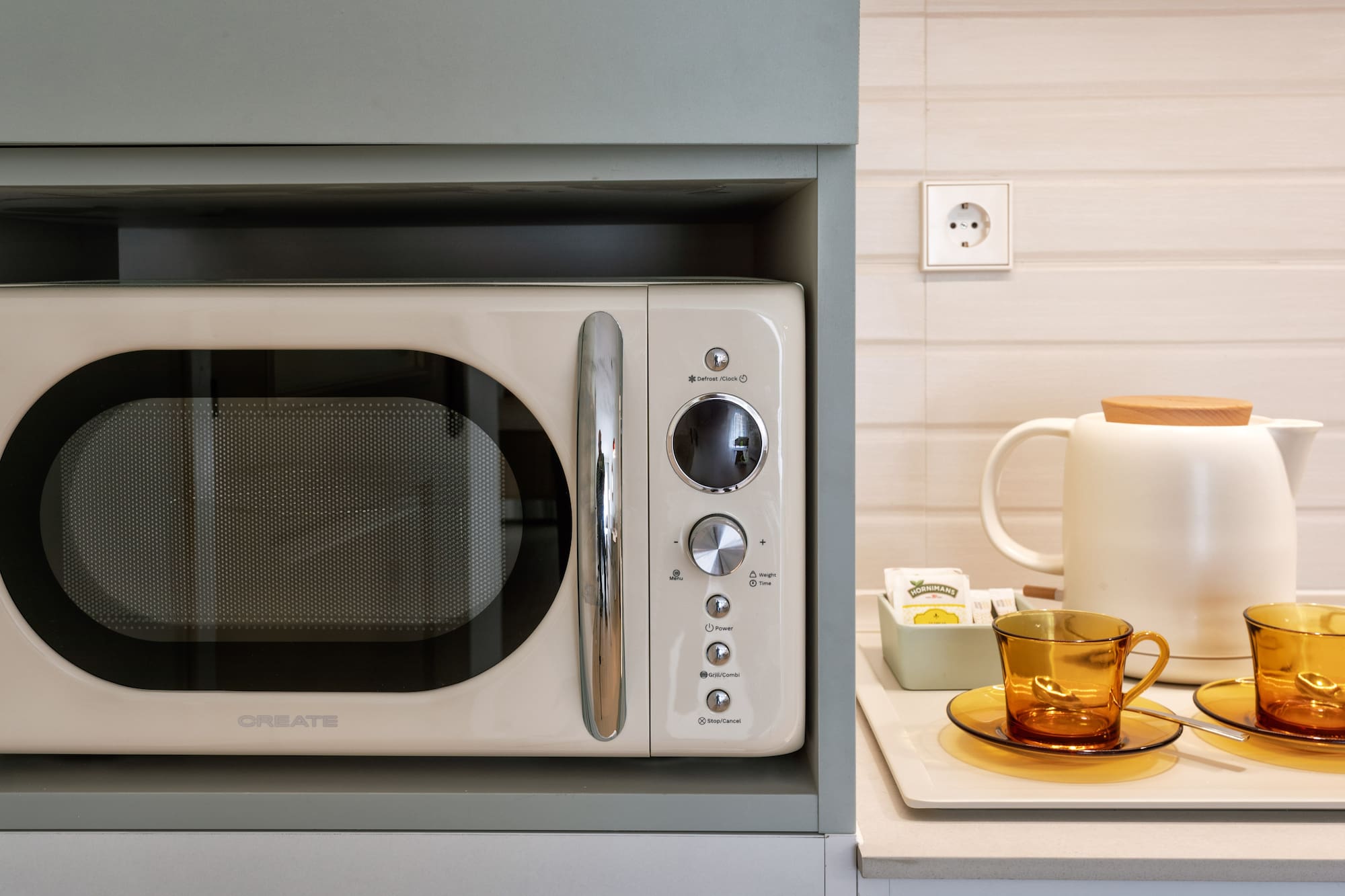 a microwave on a shelf