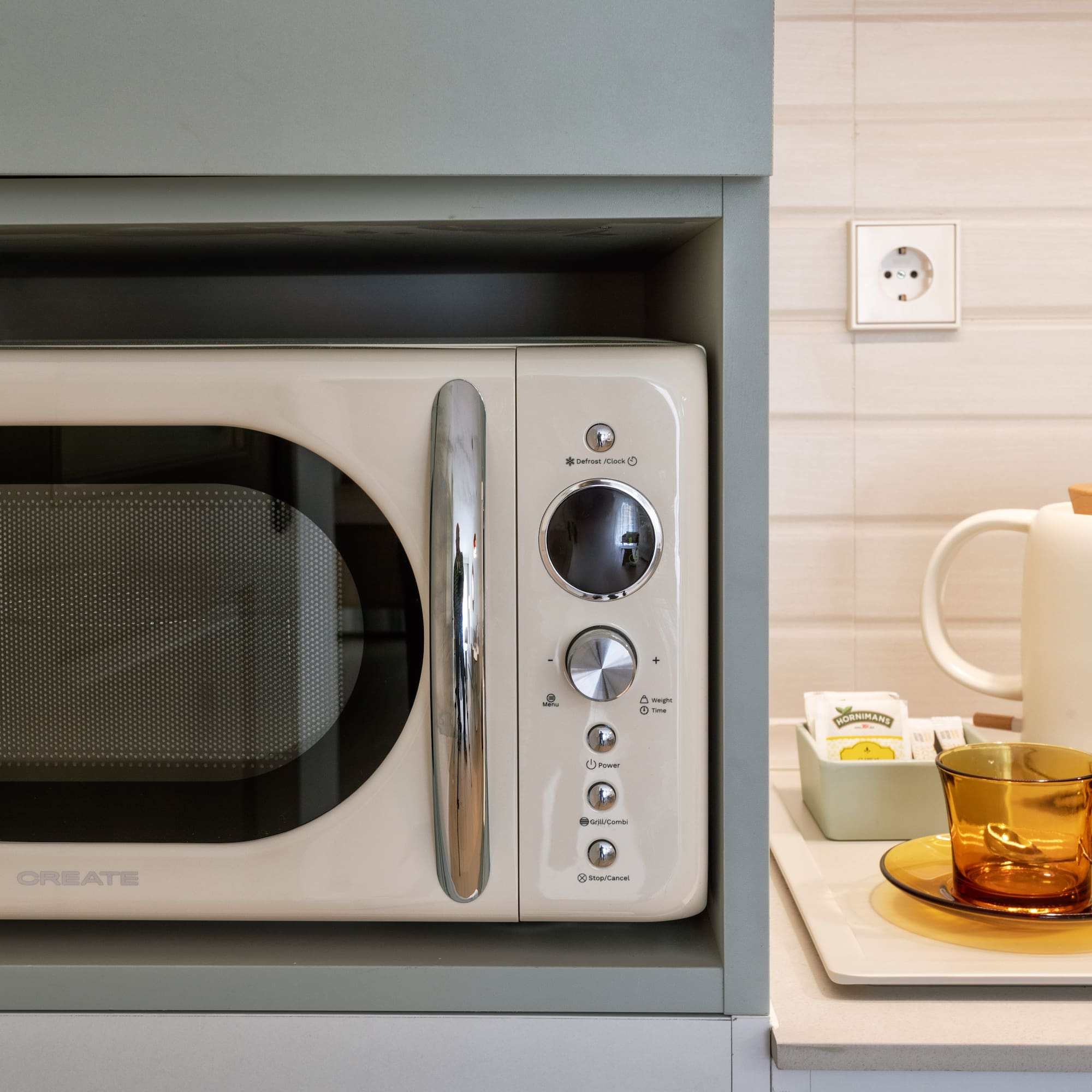 a microwave on a shelf