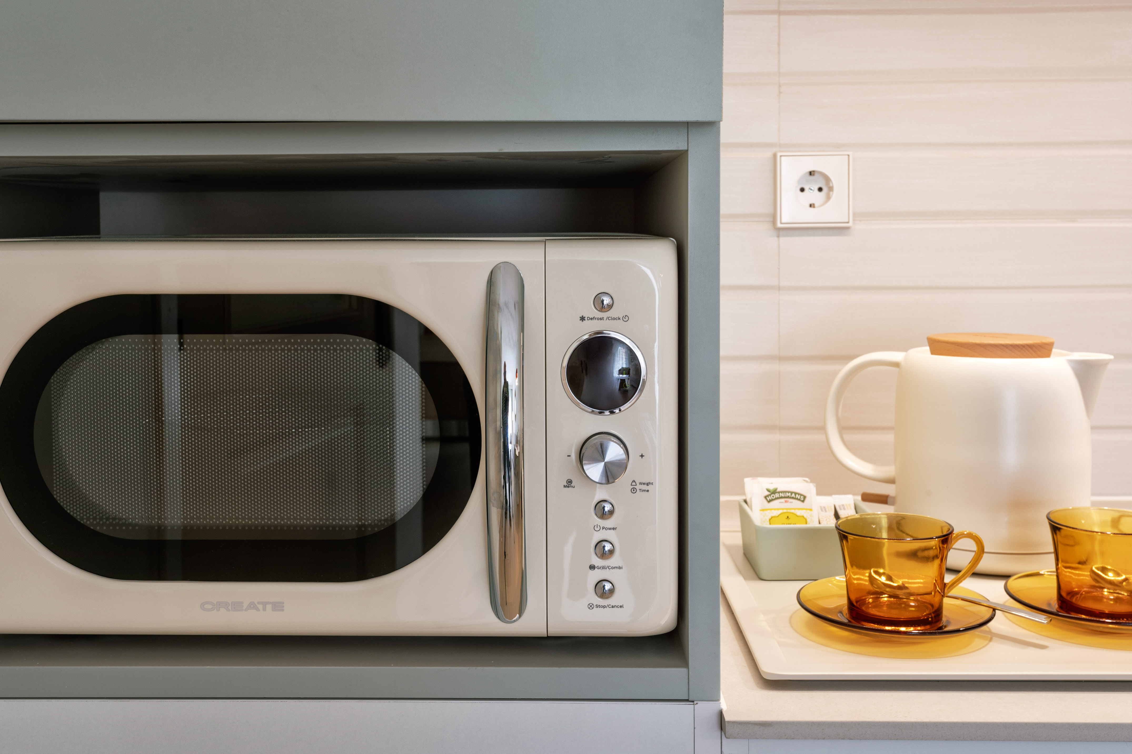 a microwave on a shelf
