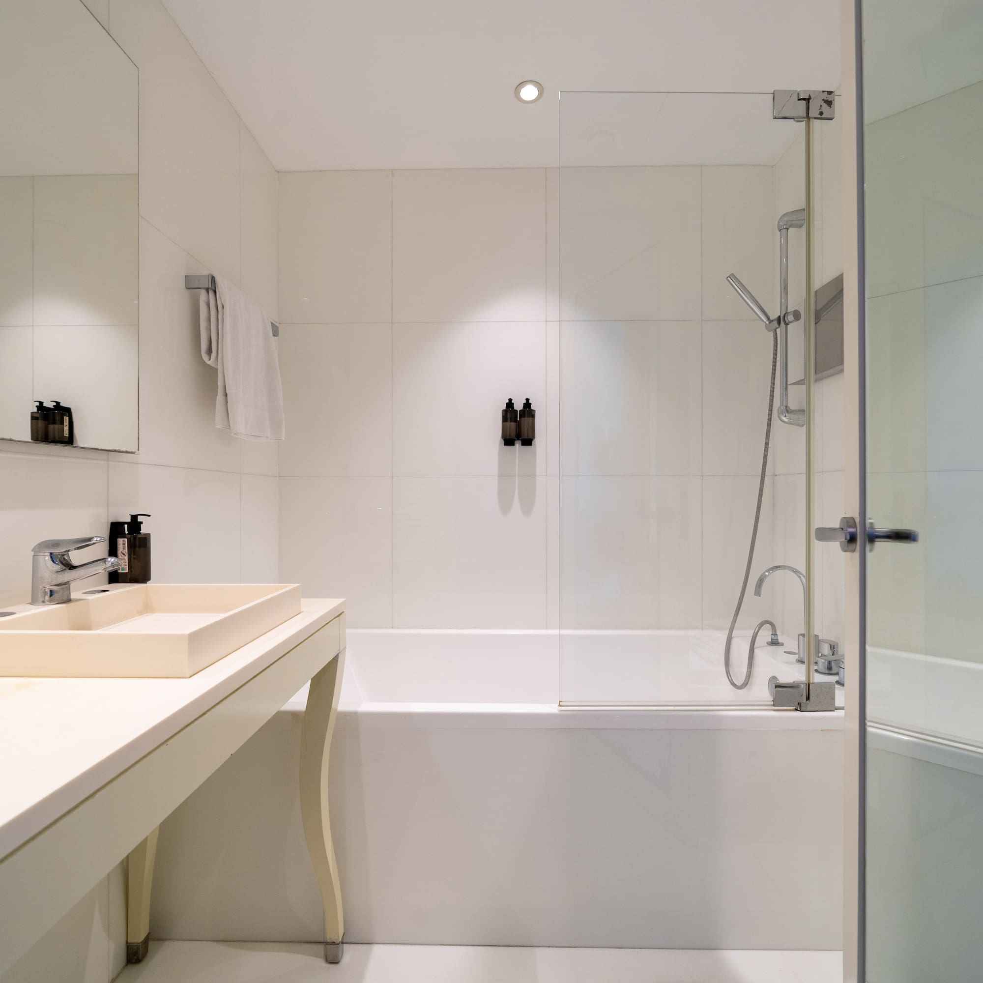 a bathroom with a sink and bathtub