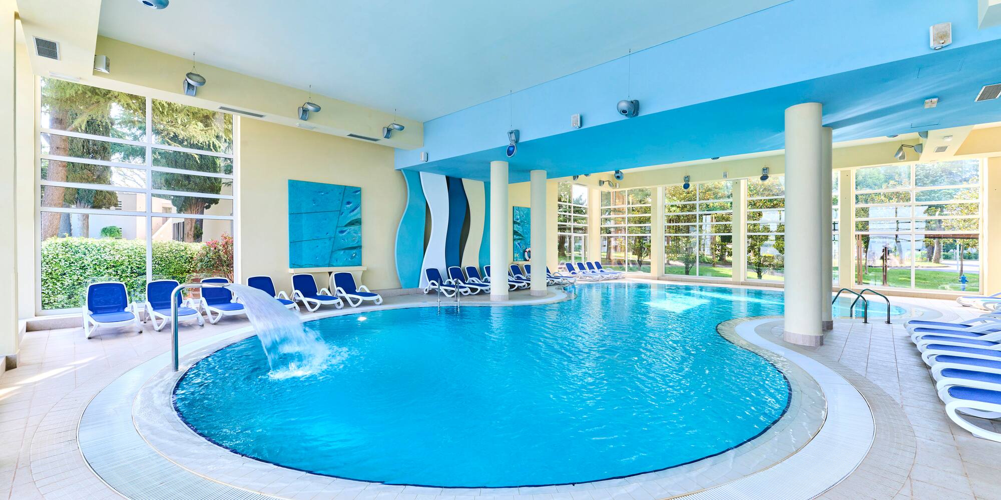 a pool with a fountain in it