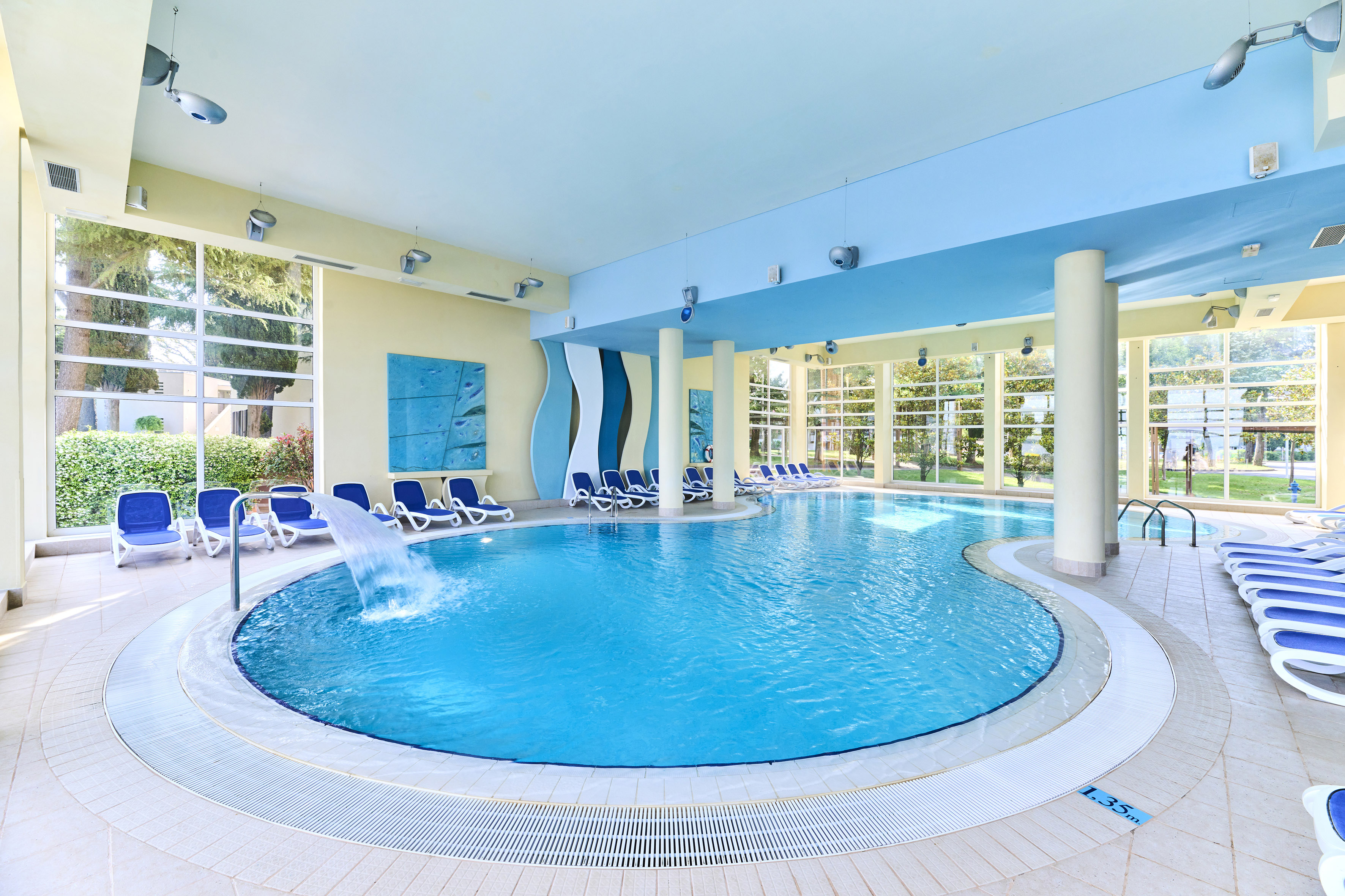 a pool with a fountain in it