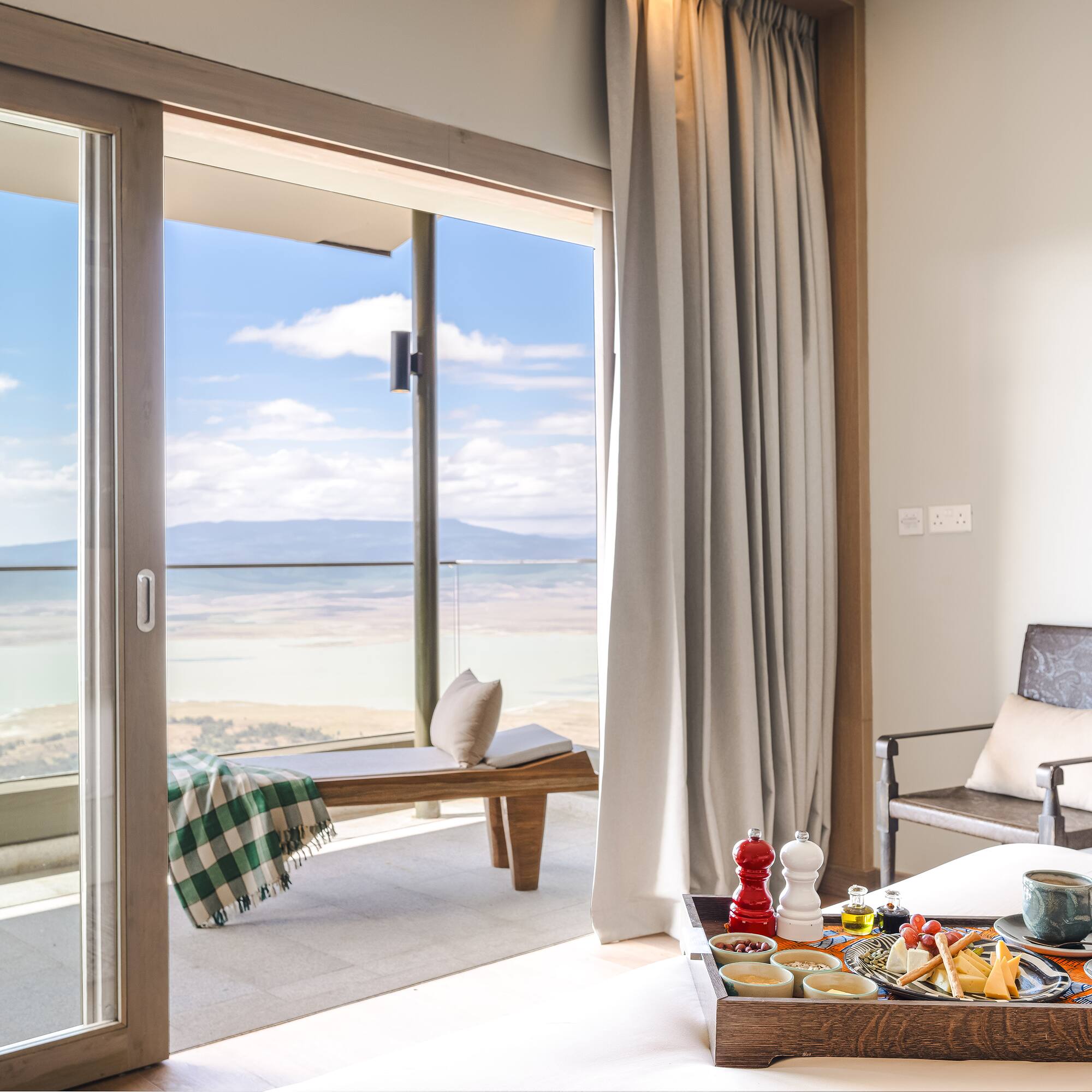 a tray of food in a room with a window