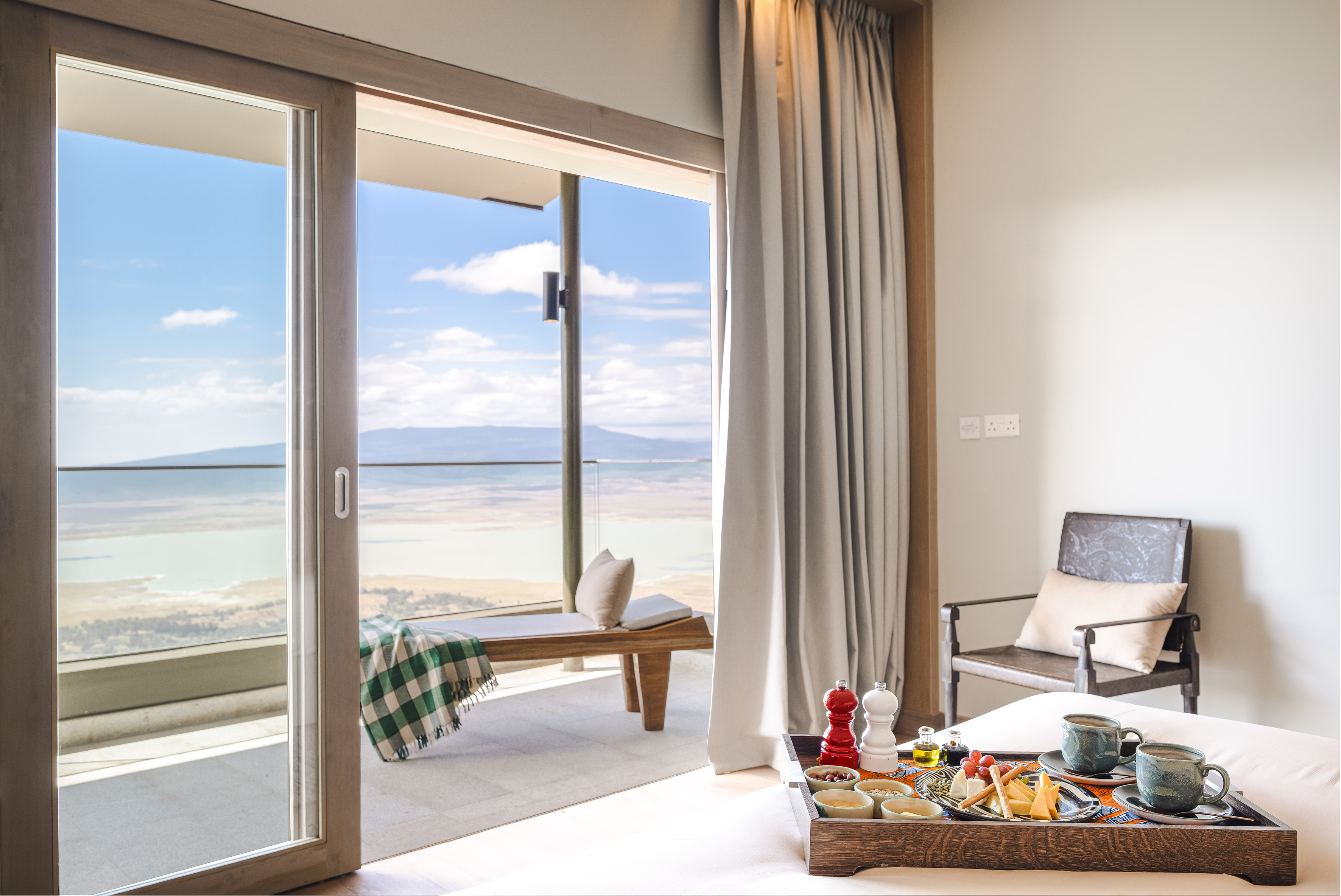 a tray of food in a room with a window