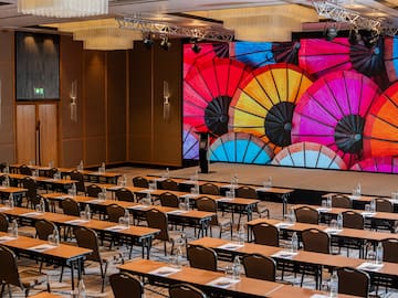 a room with tables and chairs