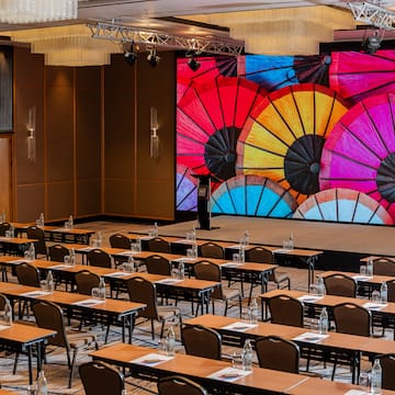 a room with tables and chairs