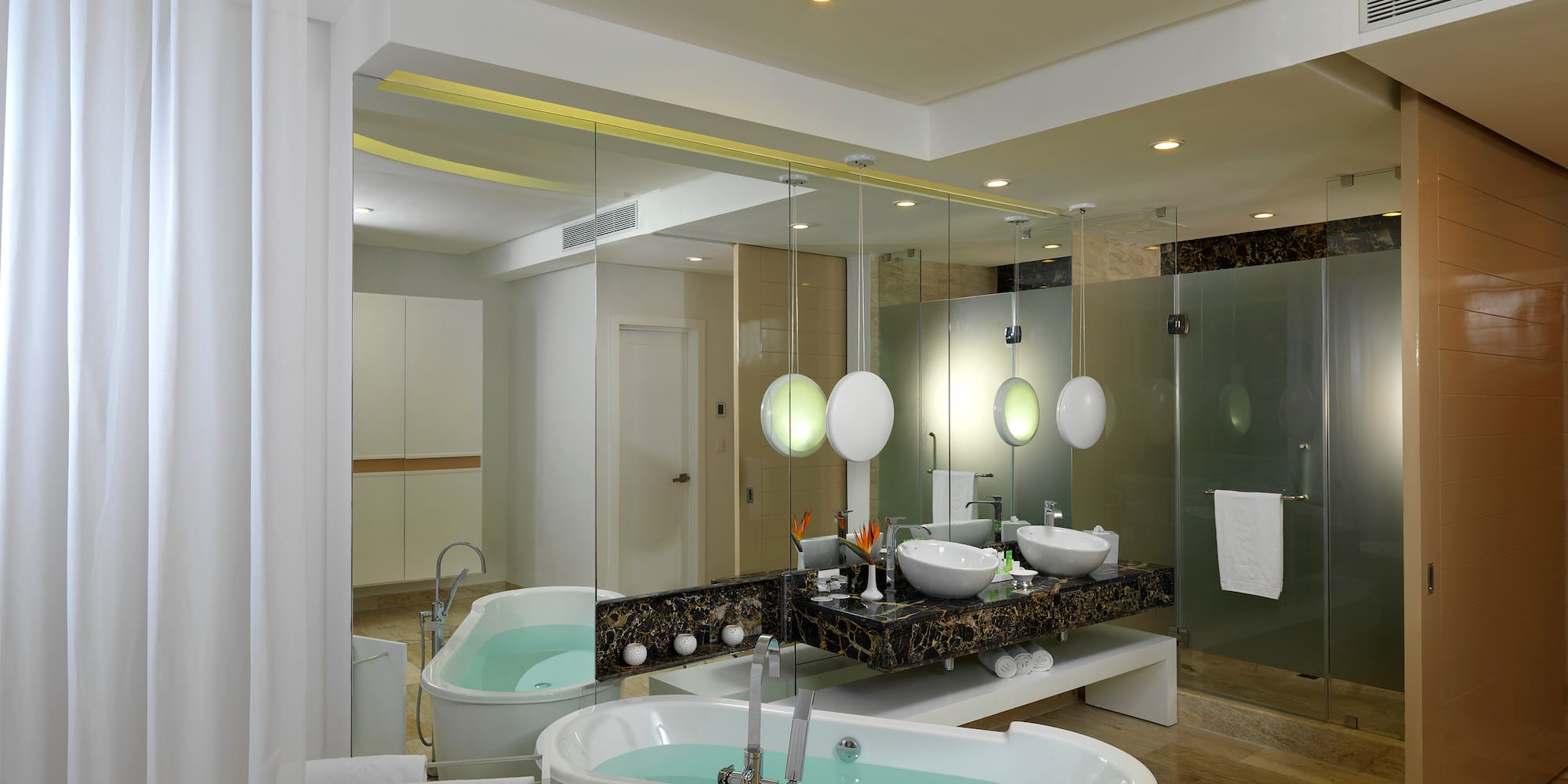 a bathroom with a tub and sink