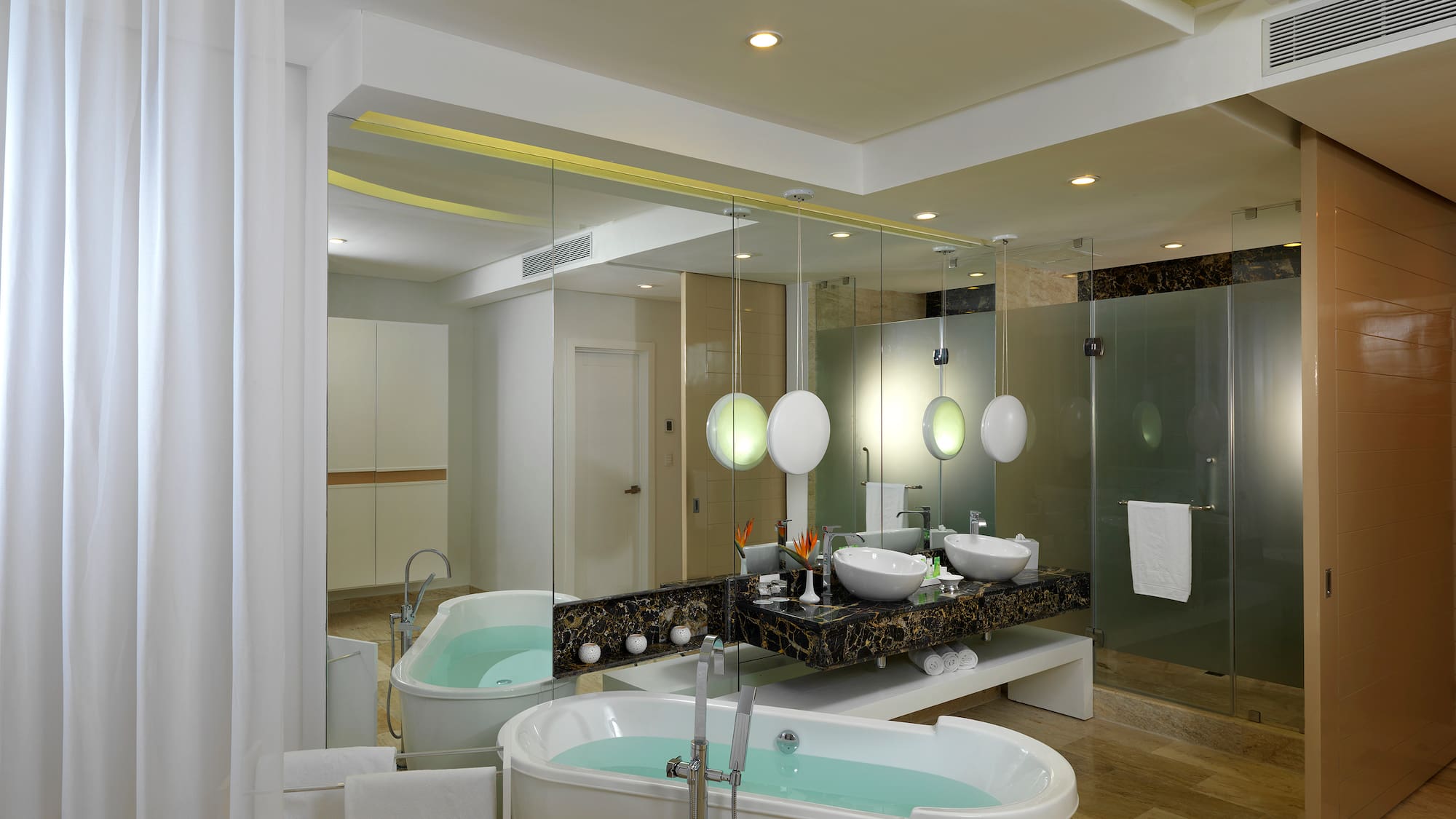 a bathroom with a tub and sink