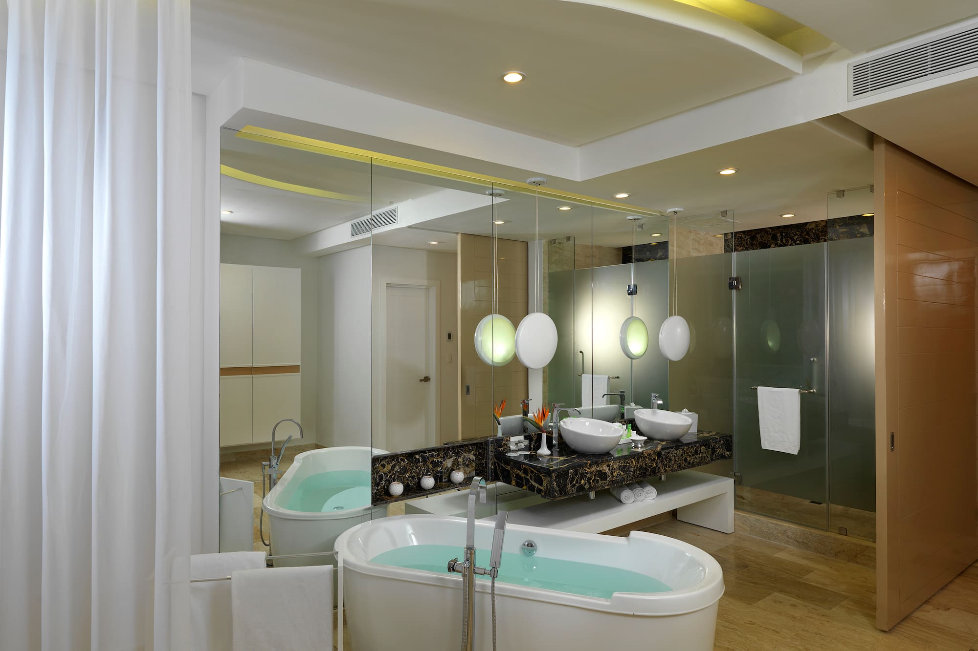 a bathroom with a tub and sink