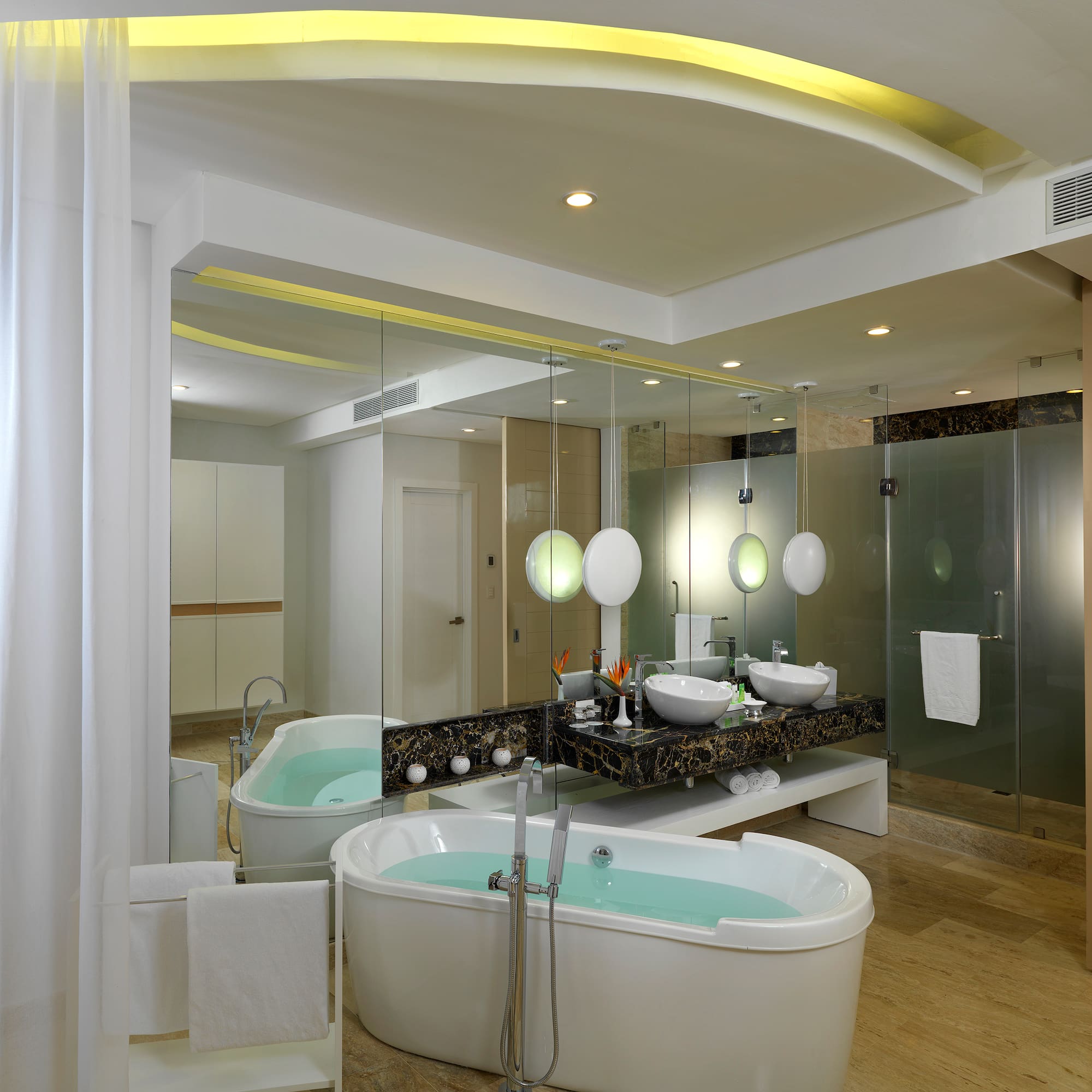 a bathroom with a tub and sink