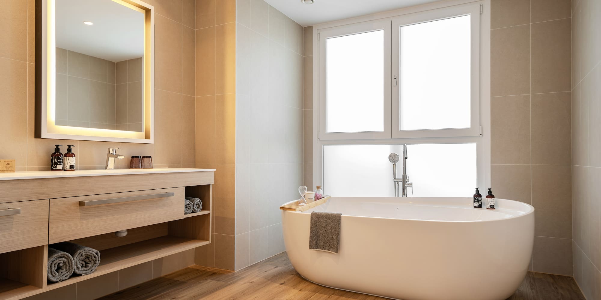 a bathroom with a tub and sink