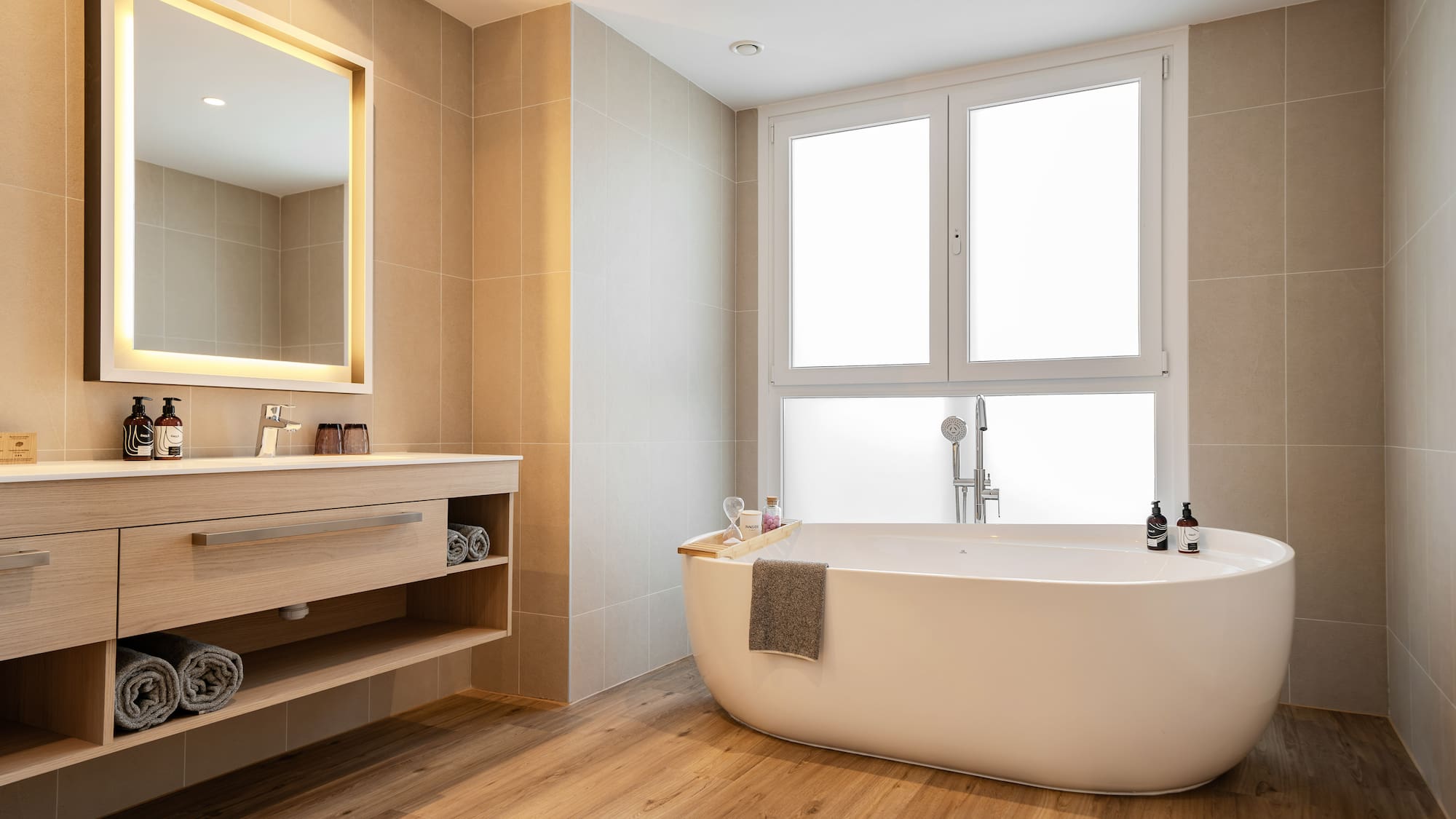 a bathroom with a tub and sink