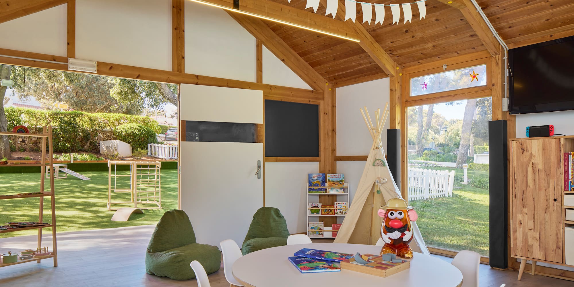 a room with a table and chairs