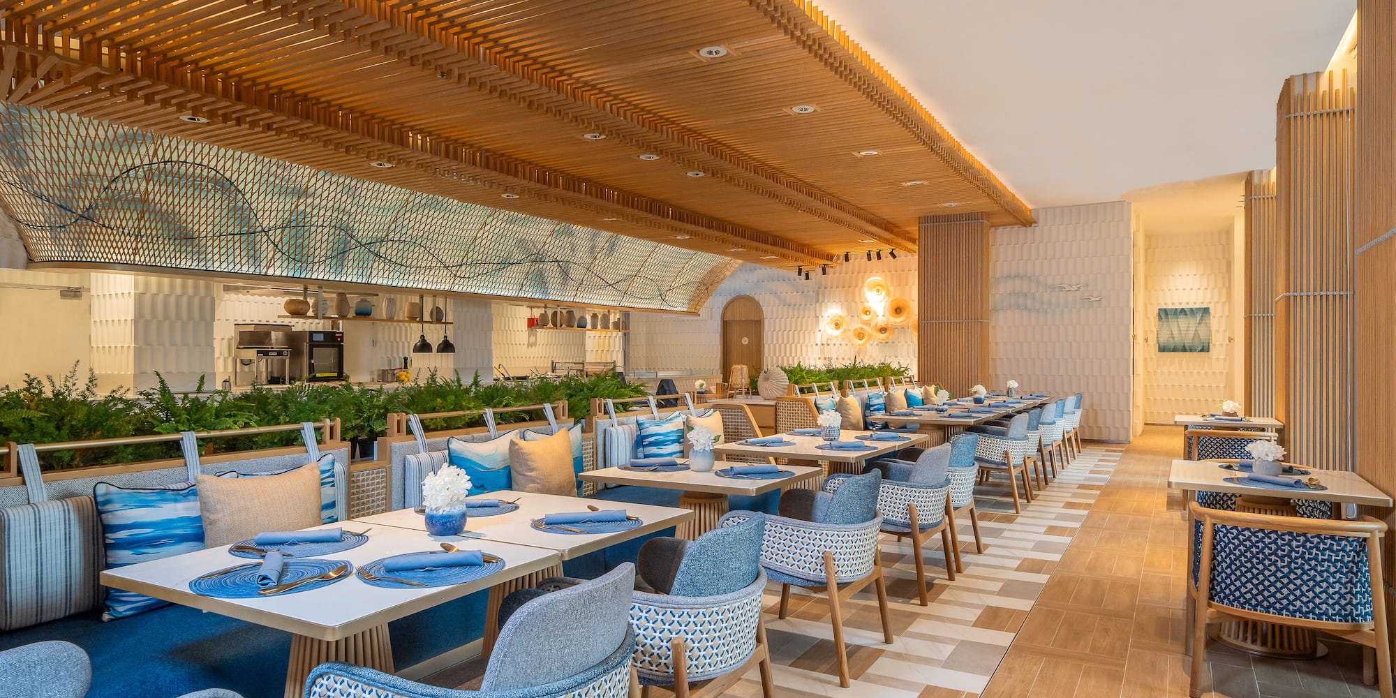 a restaurant with tables and chairs