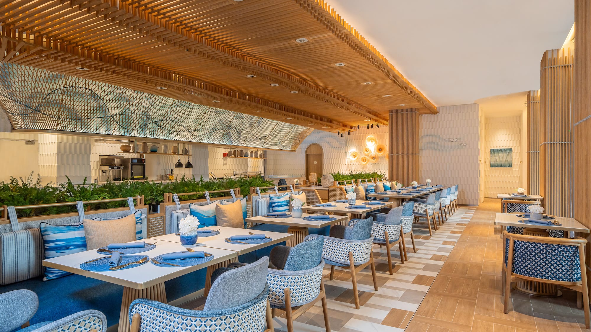 a restaurant with tables and chairs