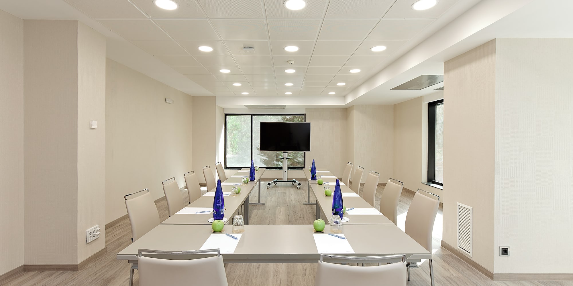 a room with a table and chairs