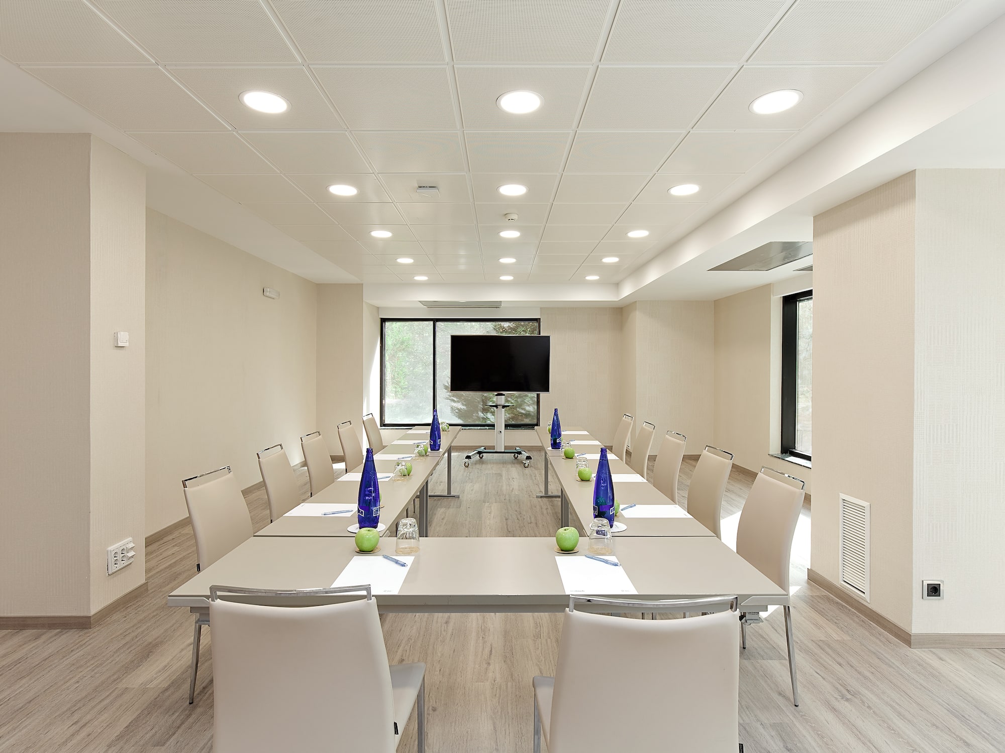 a room with a table and chairs