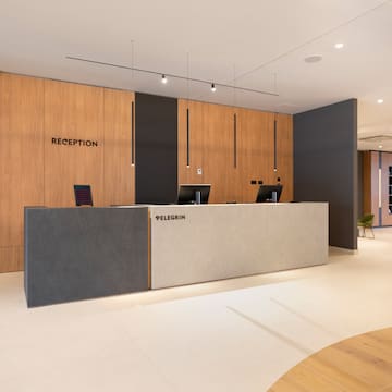 a reception desk in a hotel