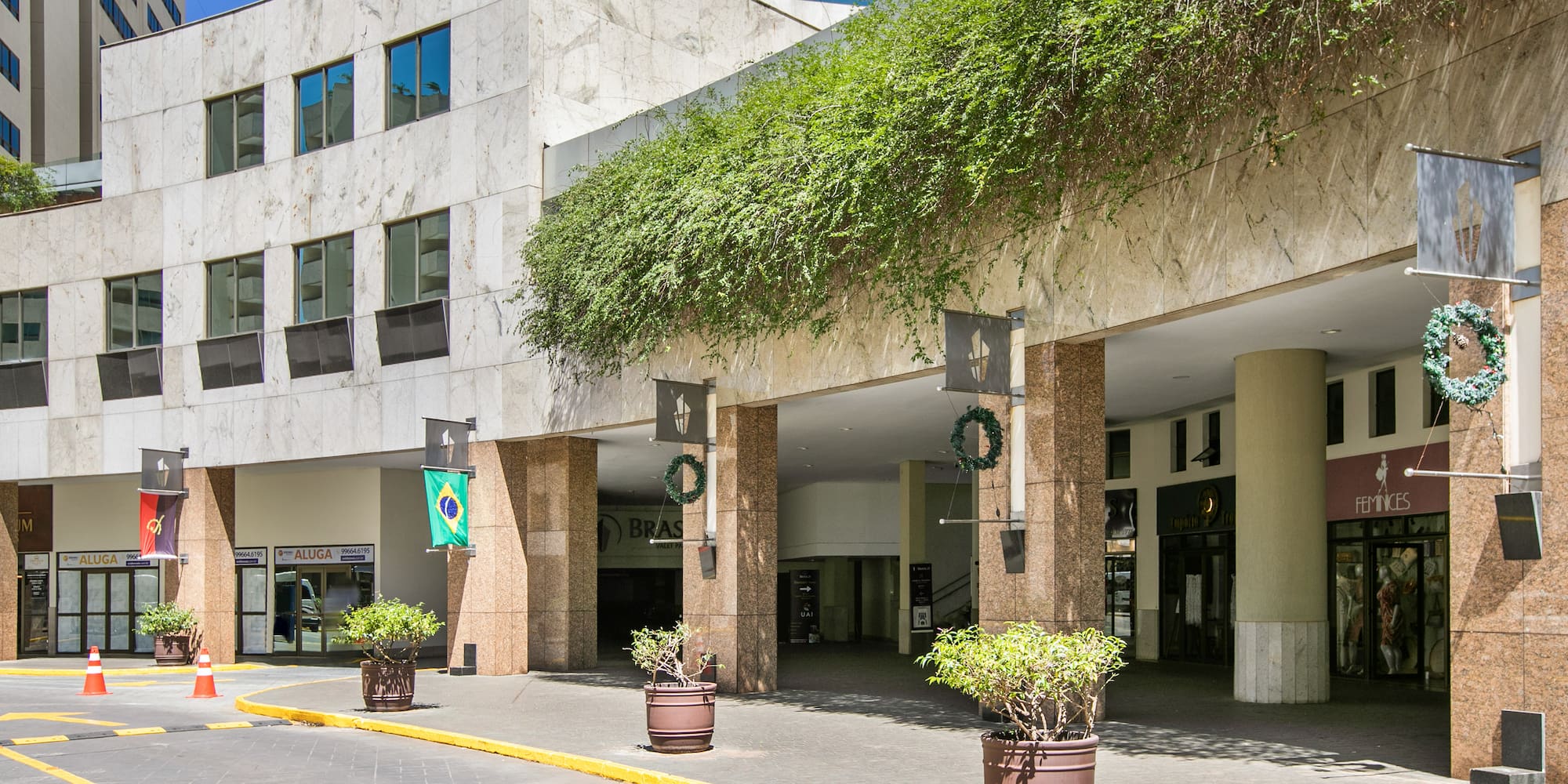 a building with plants on the front