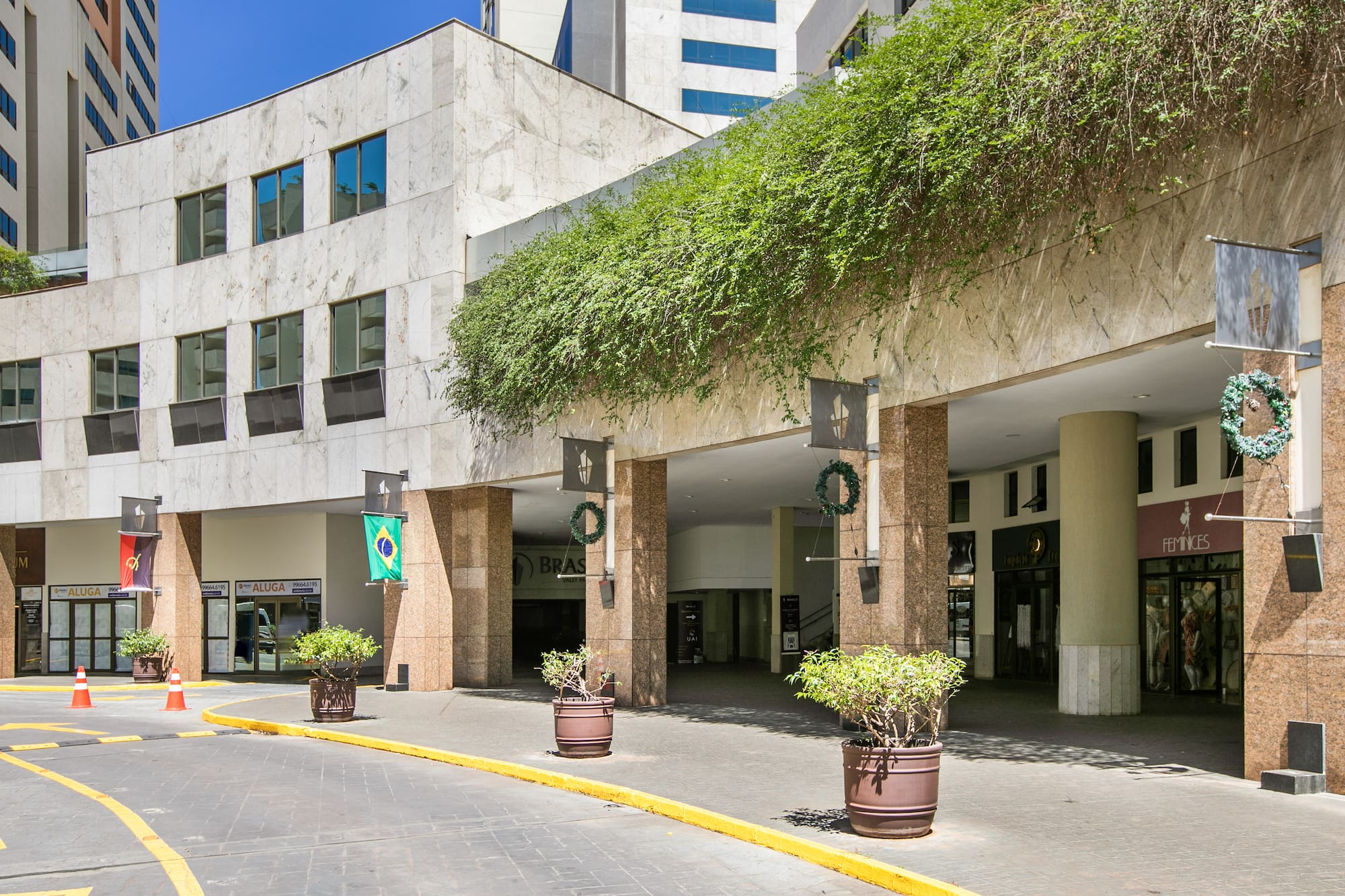 a building with plants on the front