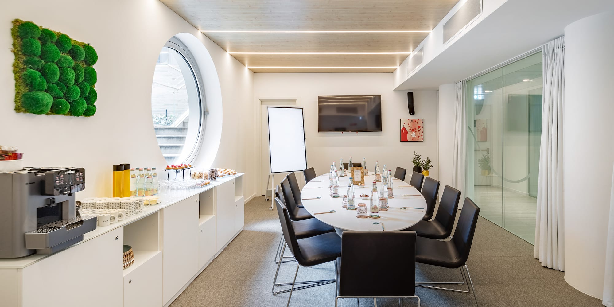 a room with a table and chairs