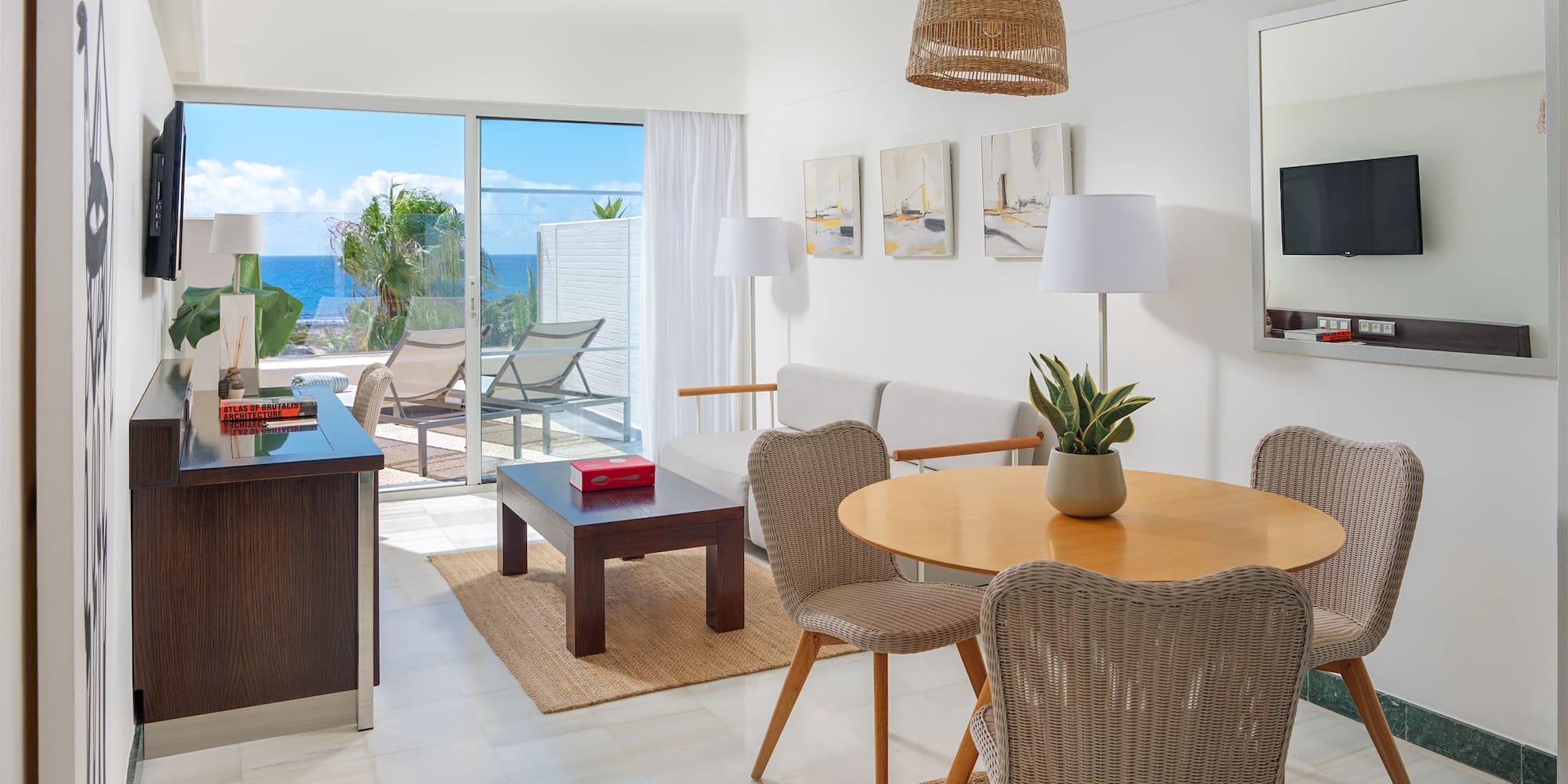 a room with a table and chairs