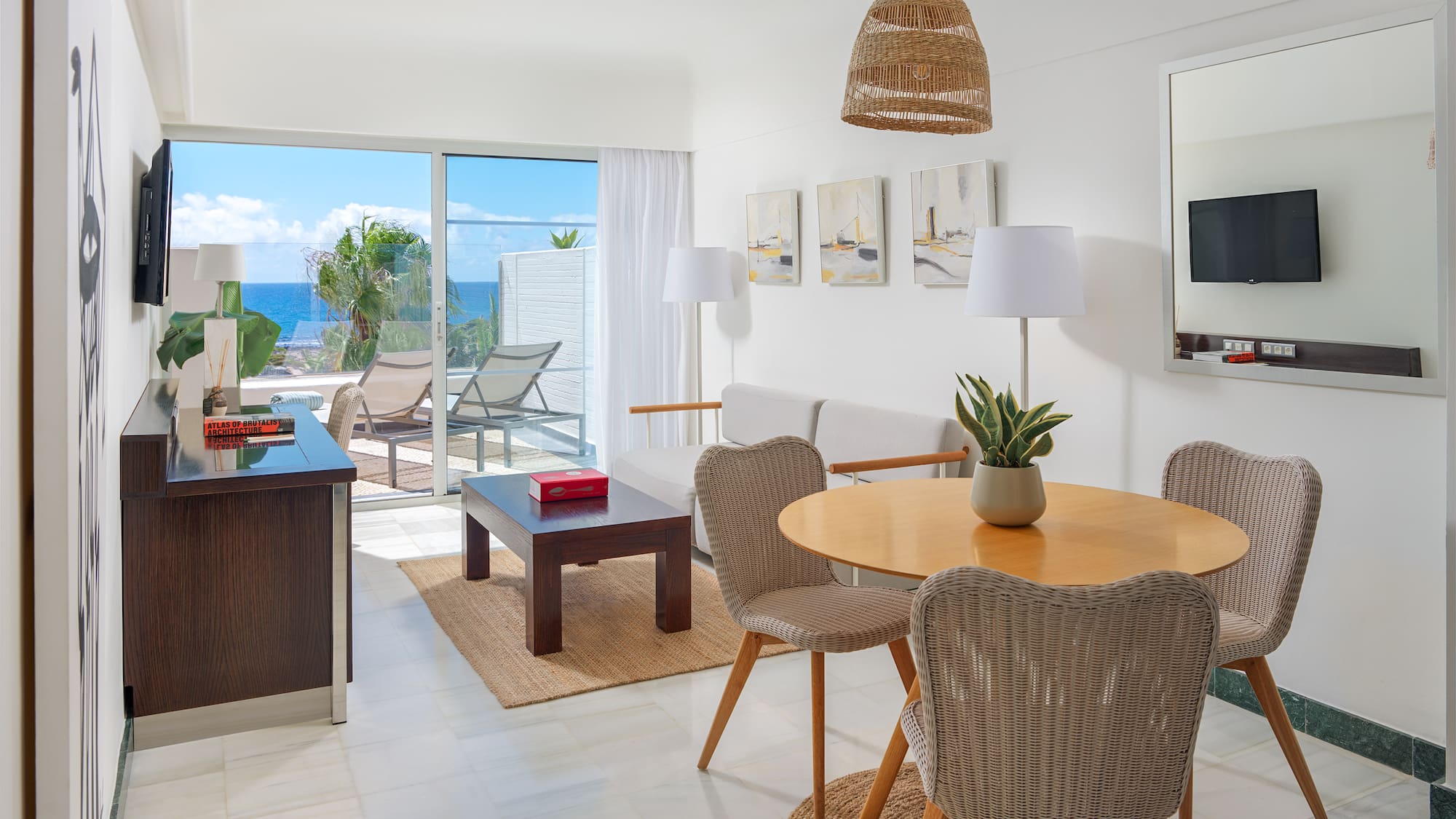 a room with a table and chairs