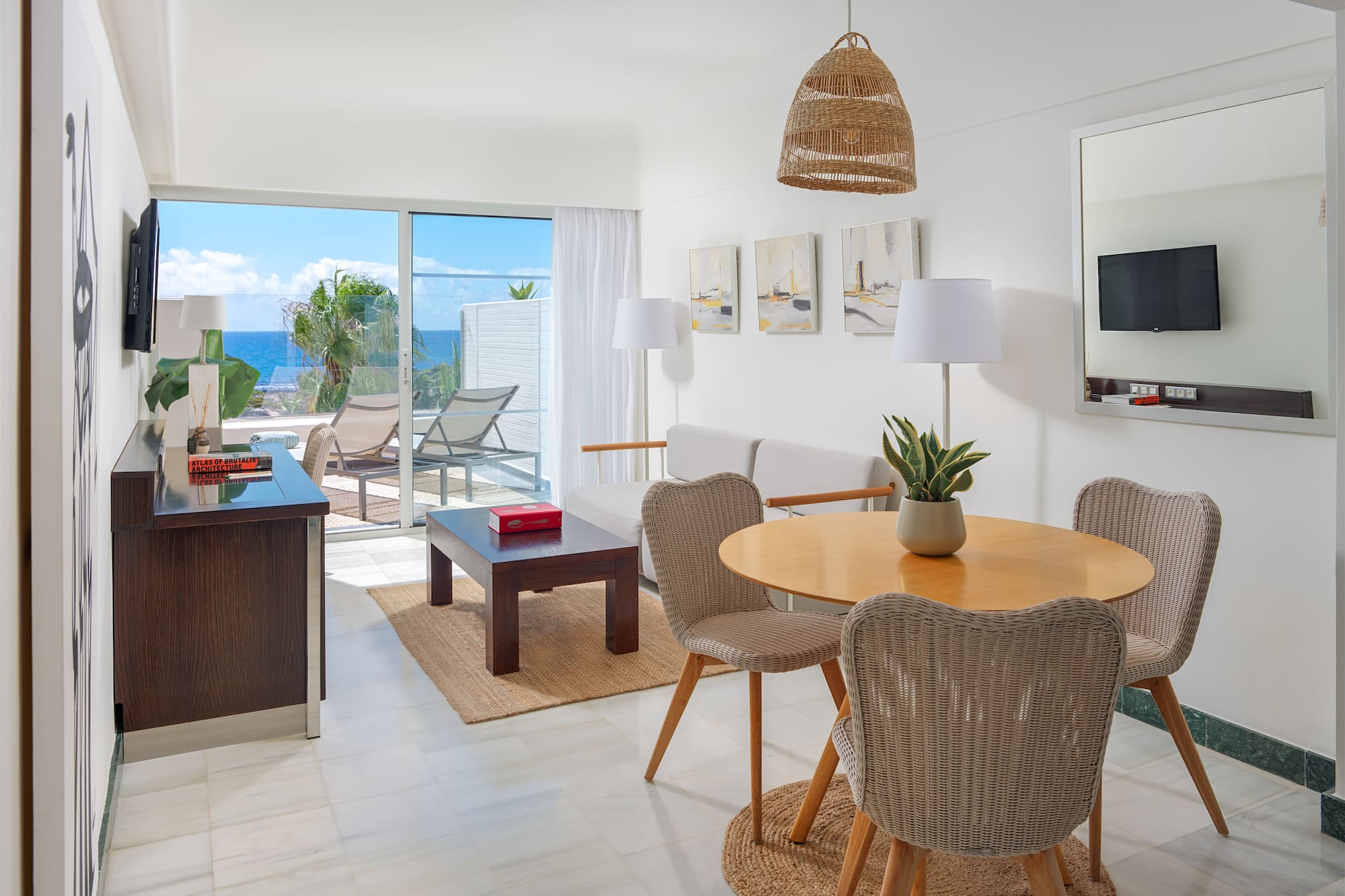 a room with a table and chairs