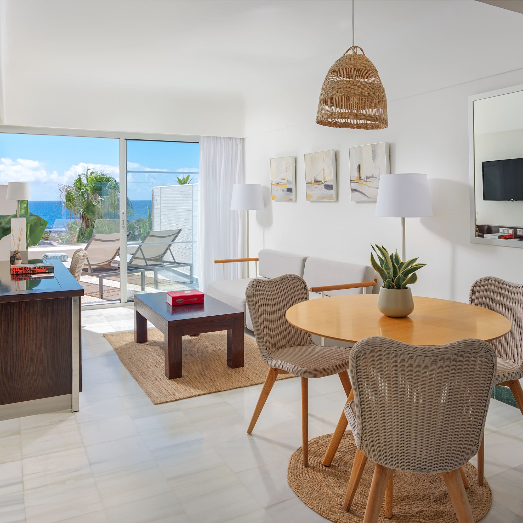 a room with a table and chairs