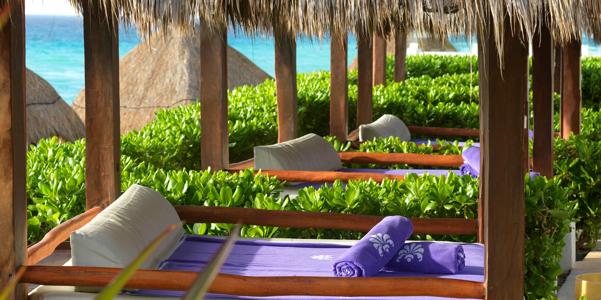 a beds under a straw canopy