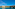 Cala Galdana bay, Menorca: beachfront hotel, sandy beach, turquoise sea, boats.