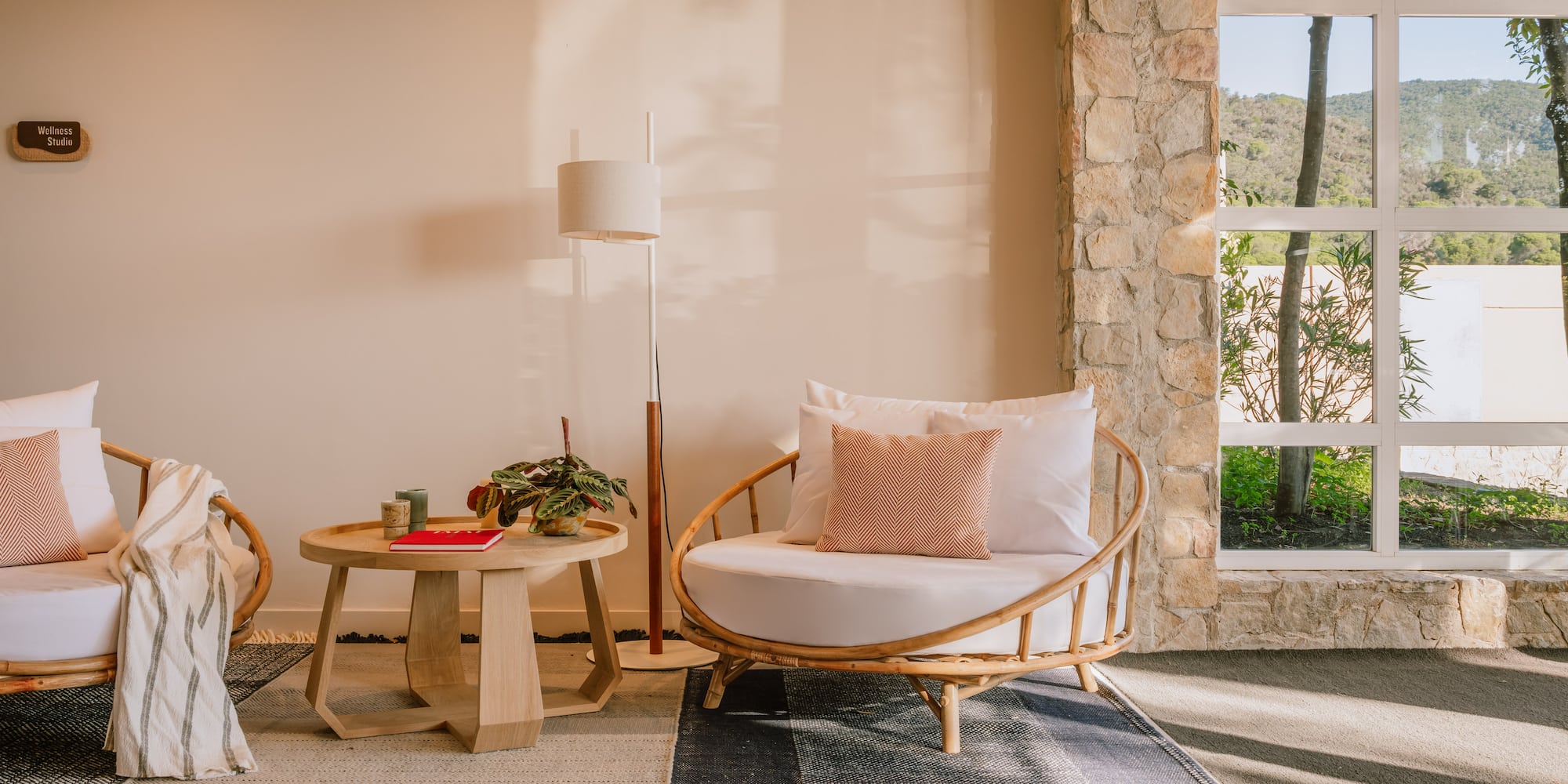 a room with a round table and a couch