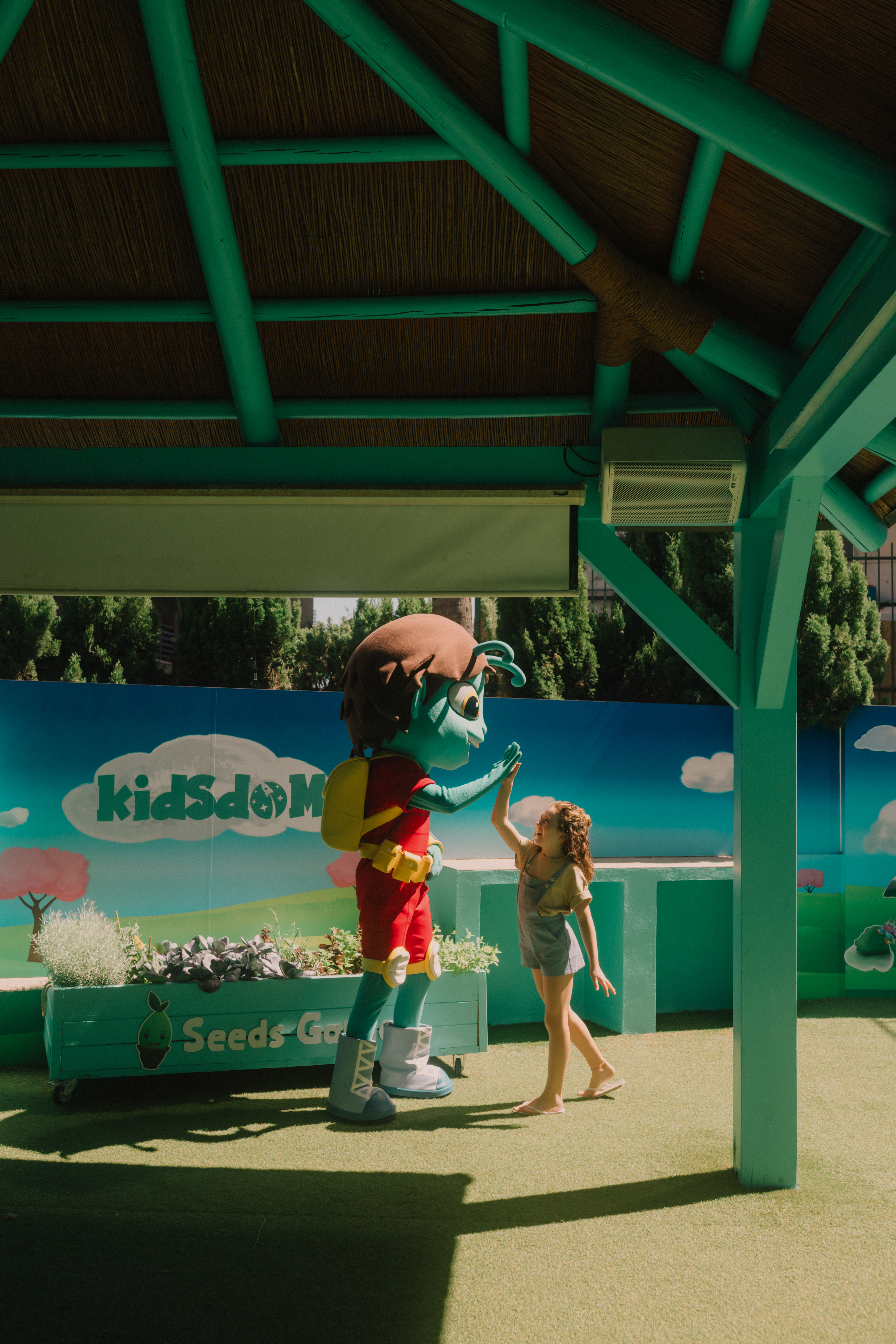 a person in a garment with a child