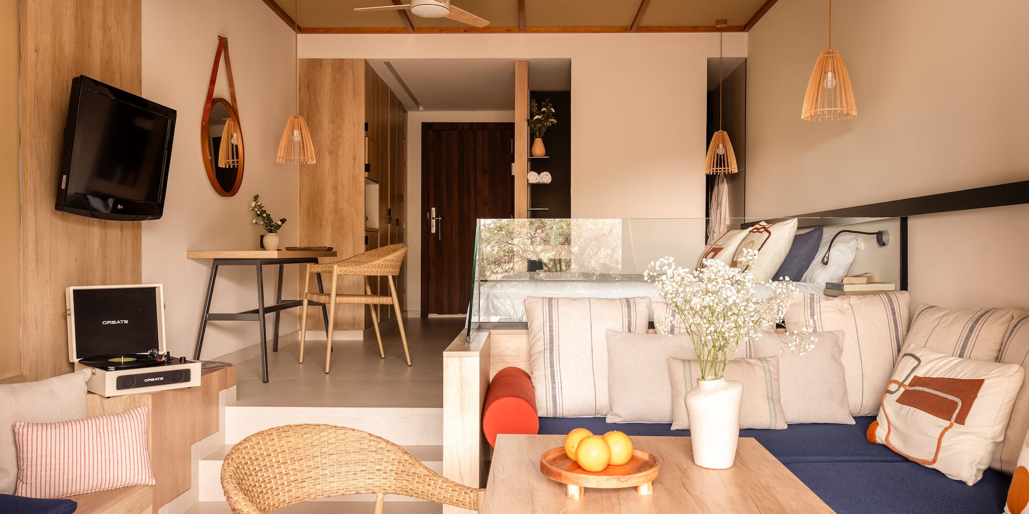 a living room with a tv and a couch