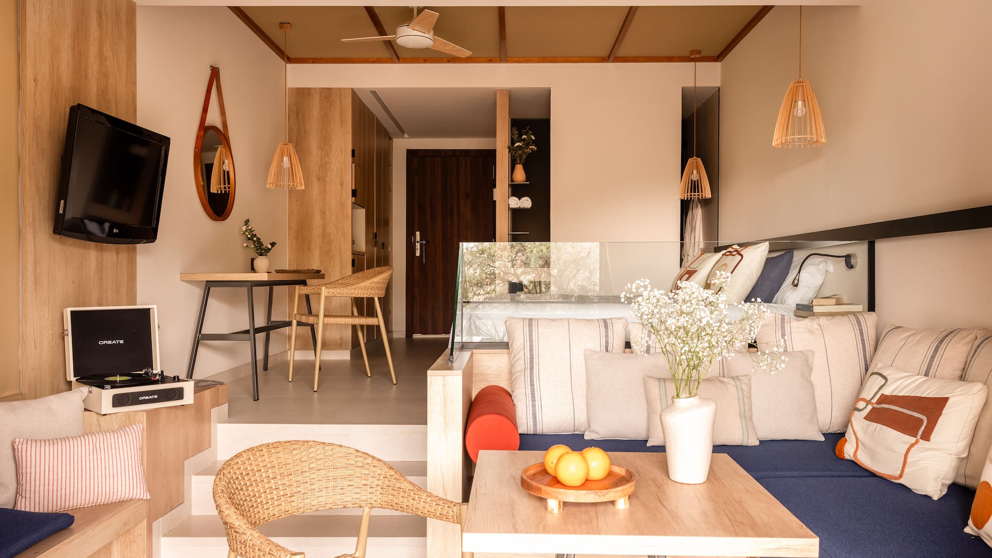 a living room with a tv and a couch