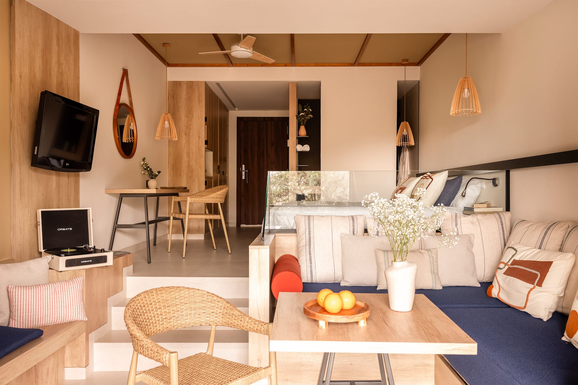 a living room with a tv and a couch