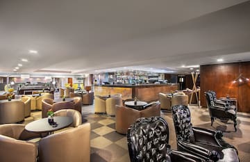 a room with tables and chairs