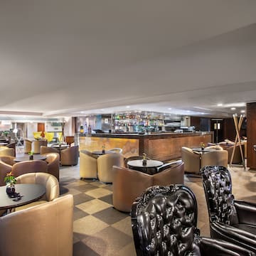 a room with tables and chairs