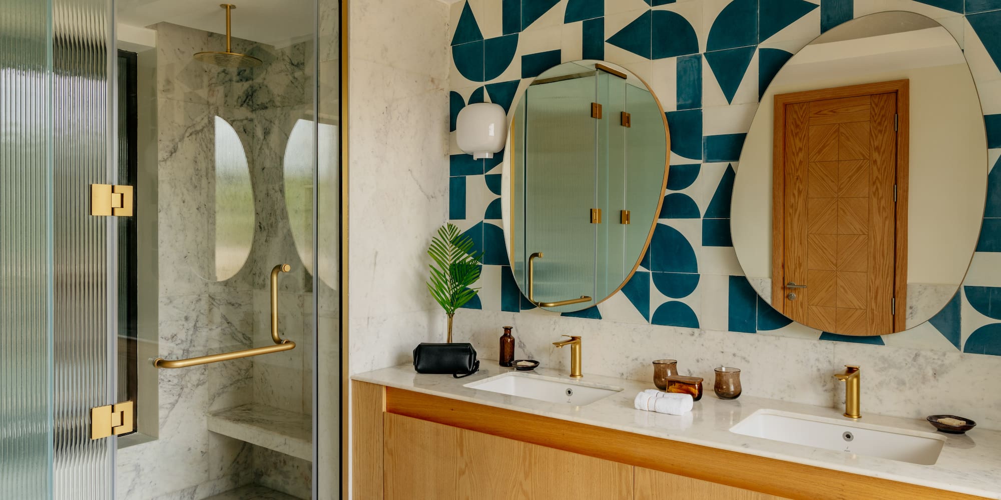 a bathroom with a shower and a mirror