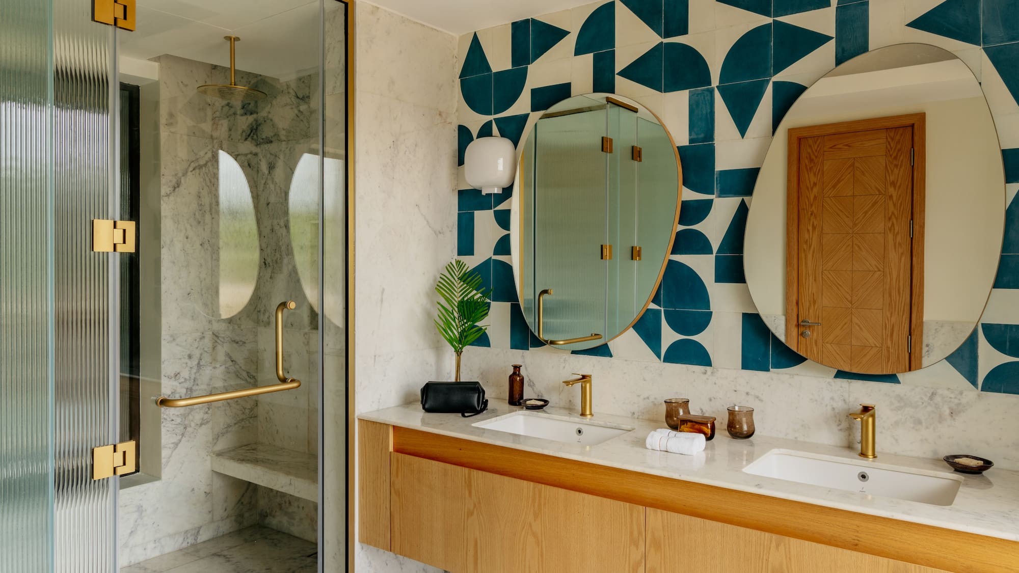 a bathroom with a shower and a mirror