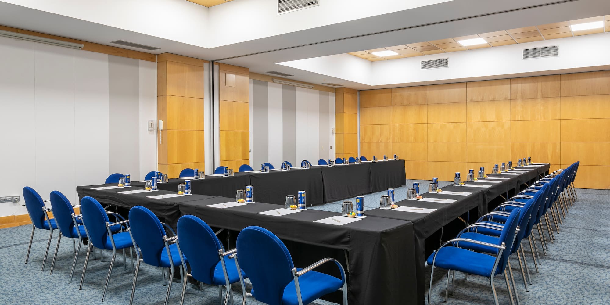 a room with tables and chairs